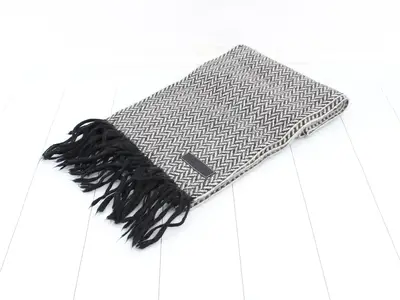 Other items in the line: accessories, small items, 100% alpaca scarves.