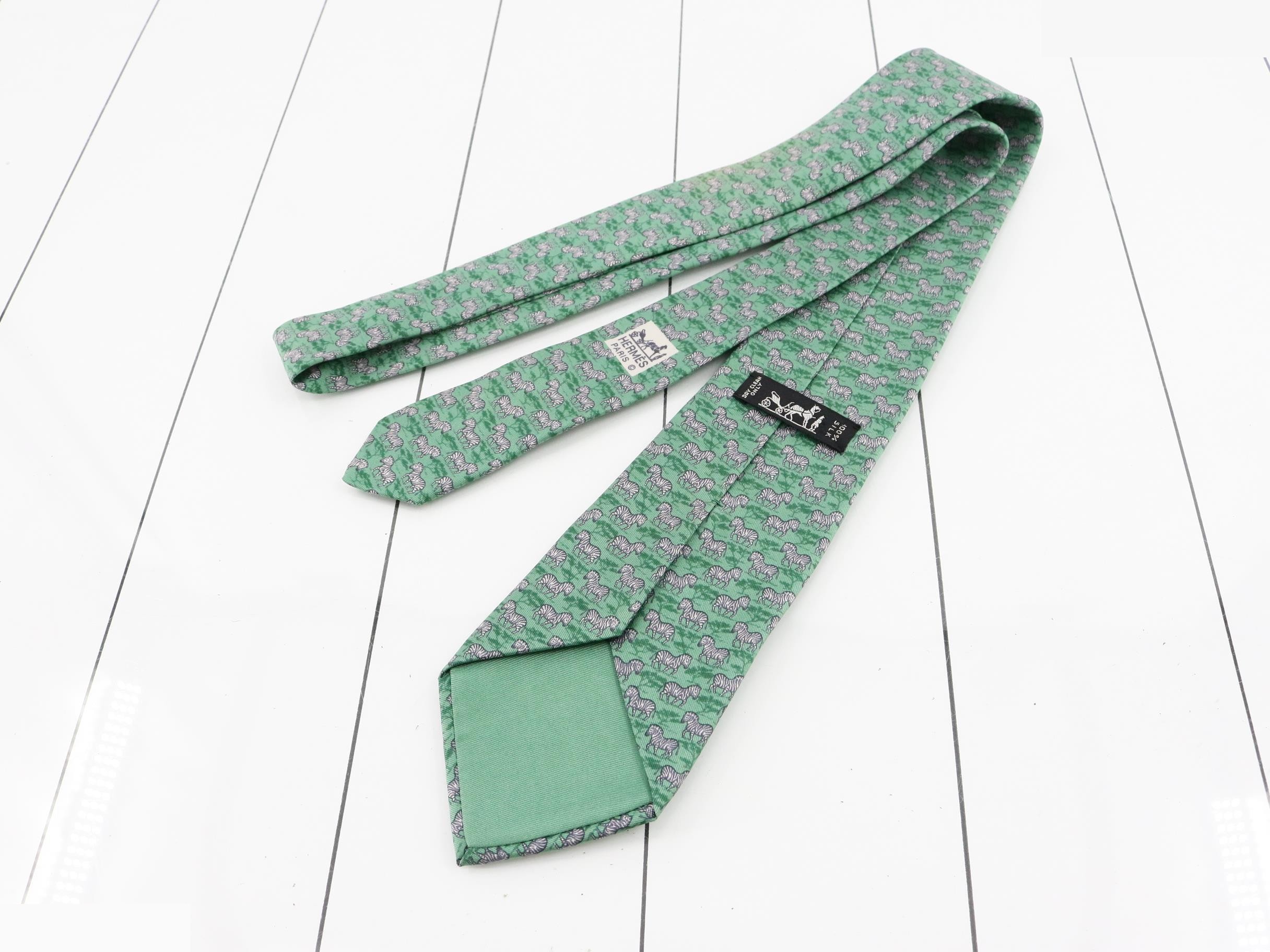 Unused Hermes tie, zebra and horse design. — view 2