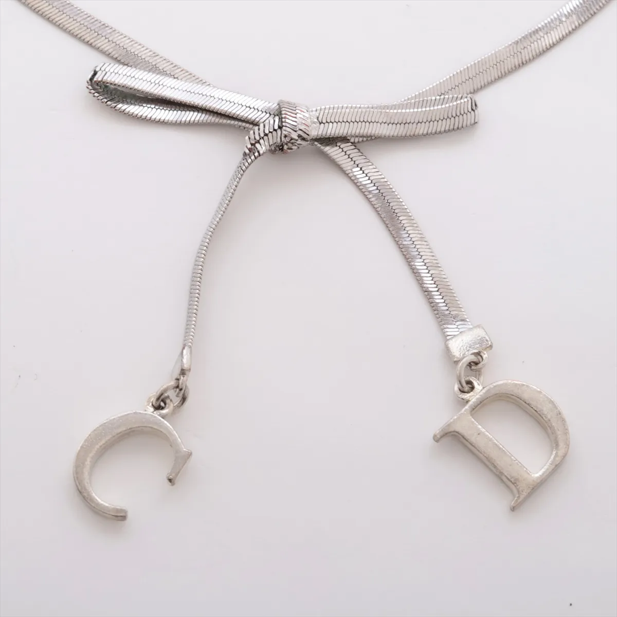 CD Ribbon Bracelet, Metal, Silver. Shows signs of wear, — view 2