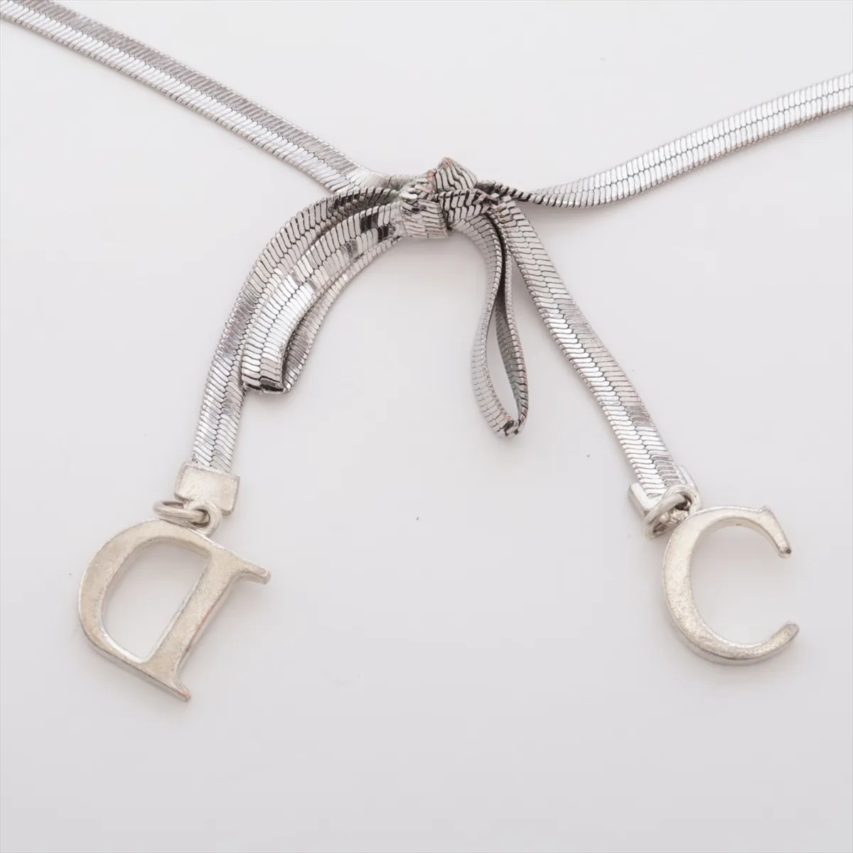 CD Ribbon Bracelet, Metal, Silver. Shows signs of wear, — view 3