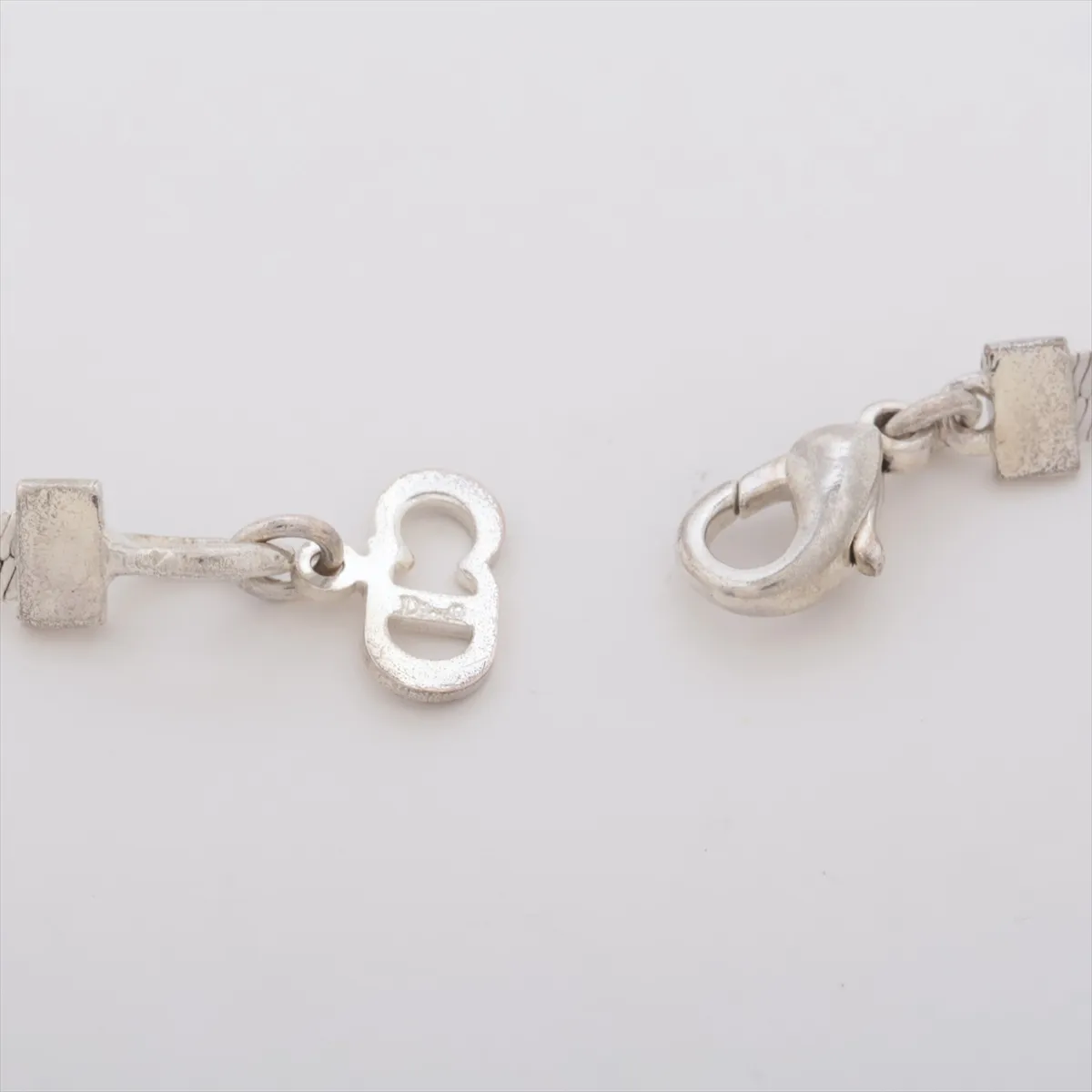 CD Ribbon Bracelet, Metal, Silver. Shows signs of wear, — view 4