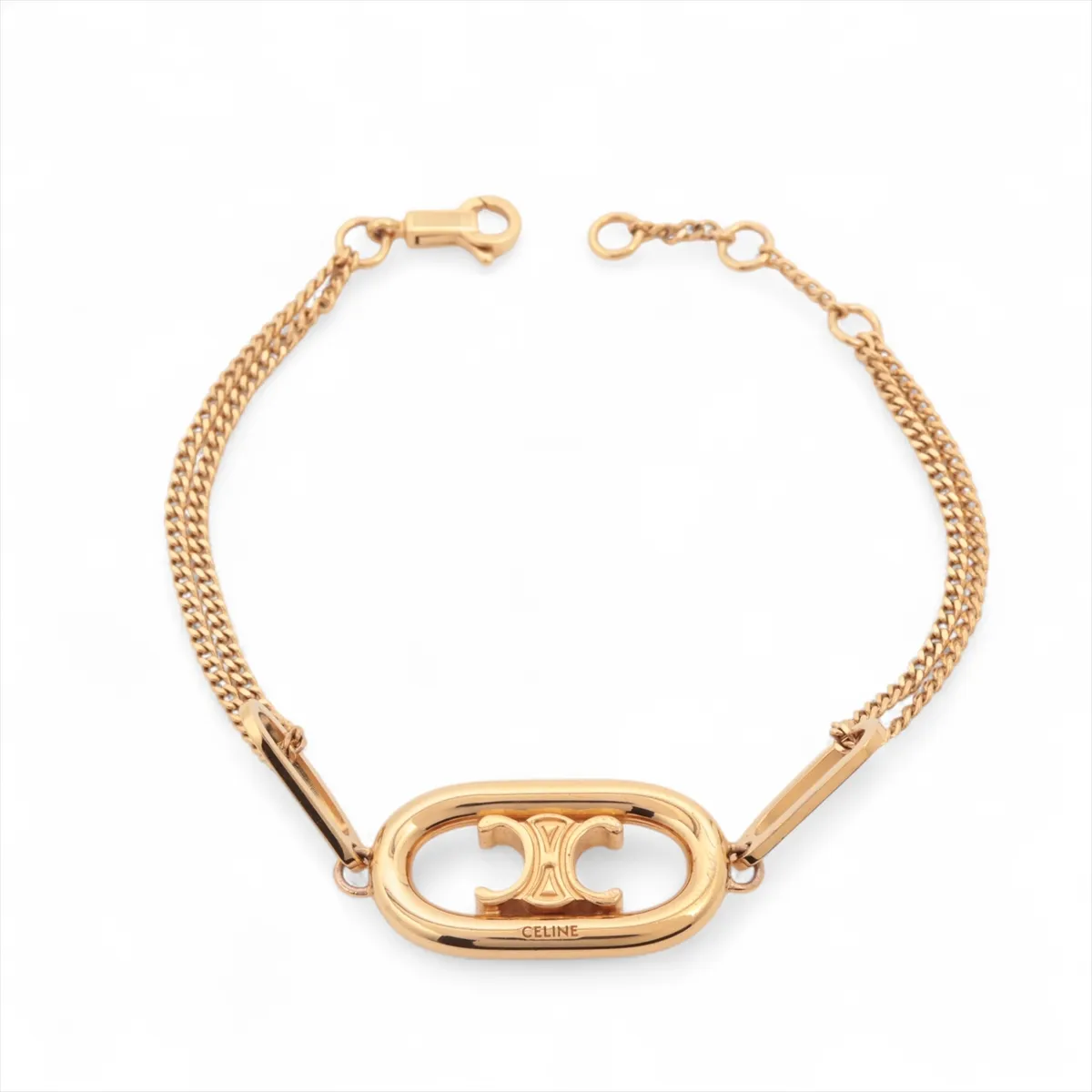 Triomphe USM0232 bracelet, GP gold. Shows signs of wear including