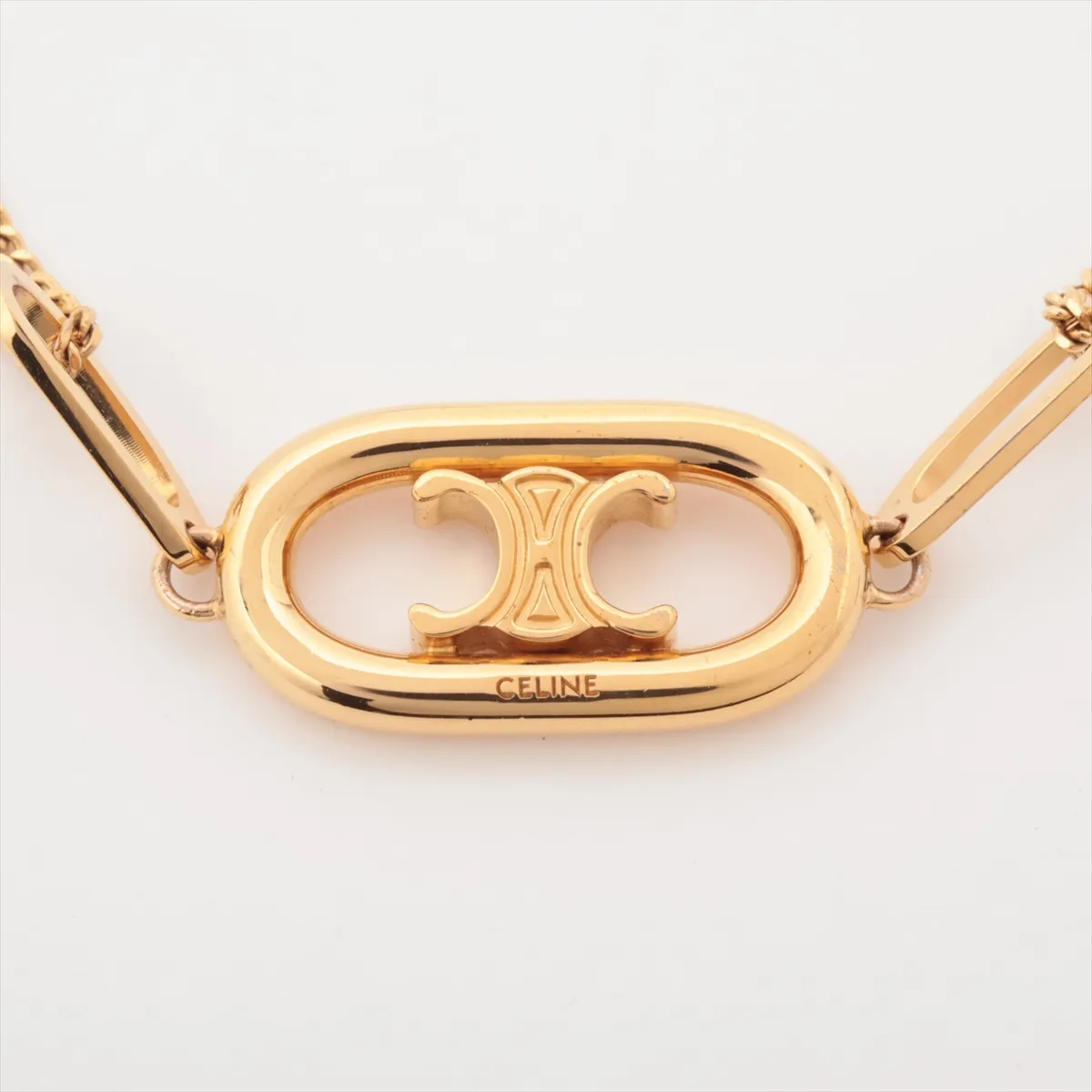 Triomphe USM0232 bracelet, GP gold. Shows signs of wear including — view 2