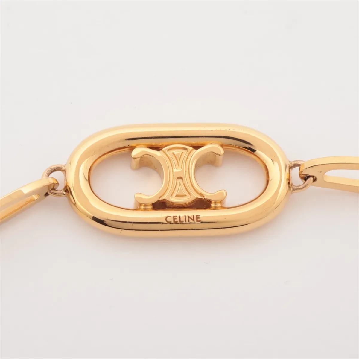 Triomphe USM0232 bracelet, GP gold. Shows signs of wear including — view 3