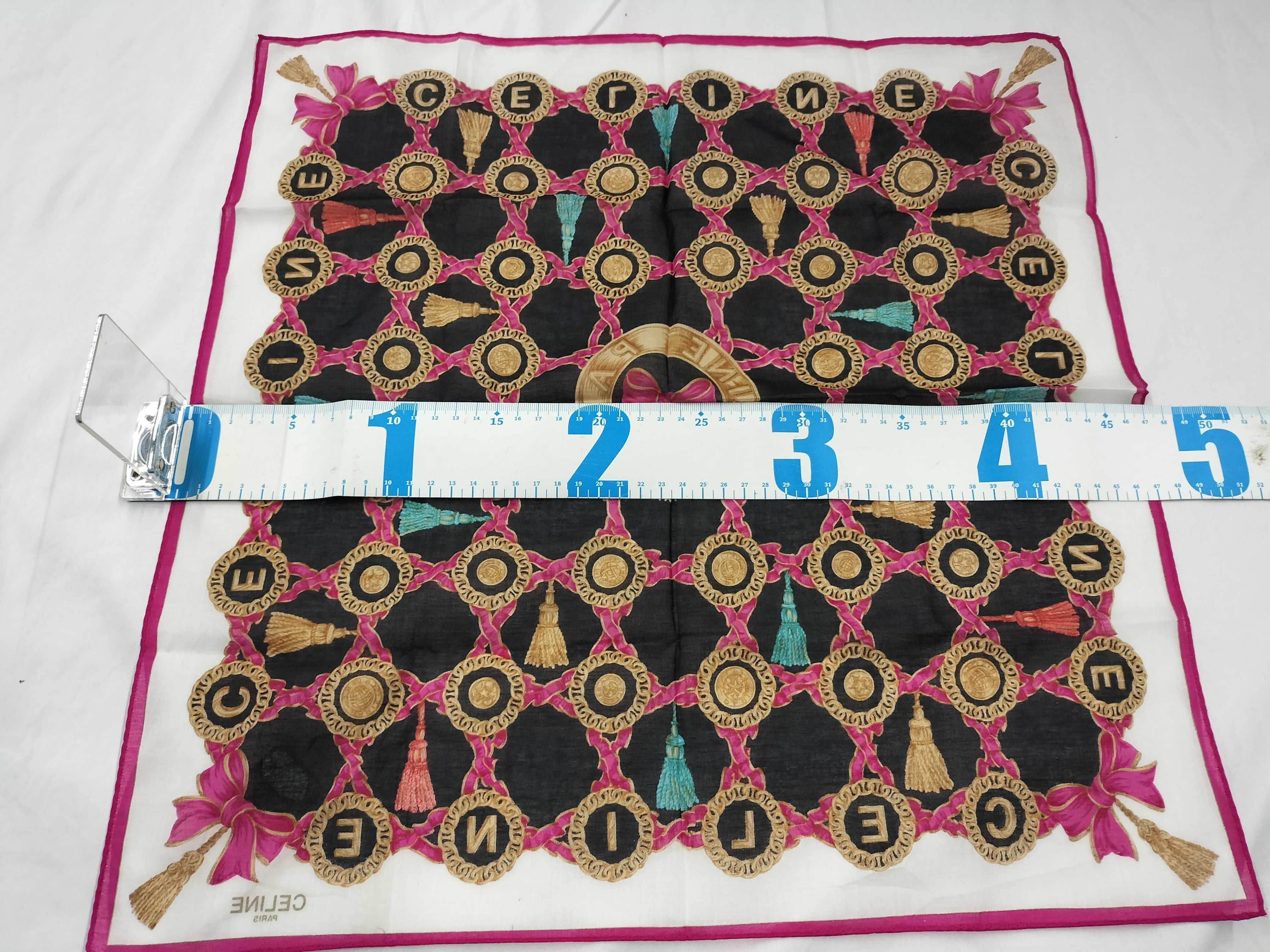 handkerchief scarf with sticker, ribbon, tassel, logo, and other accessories. — view 2