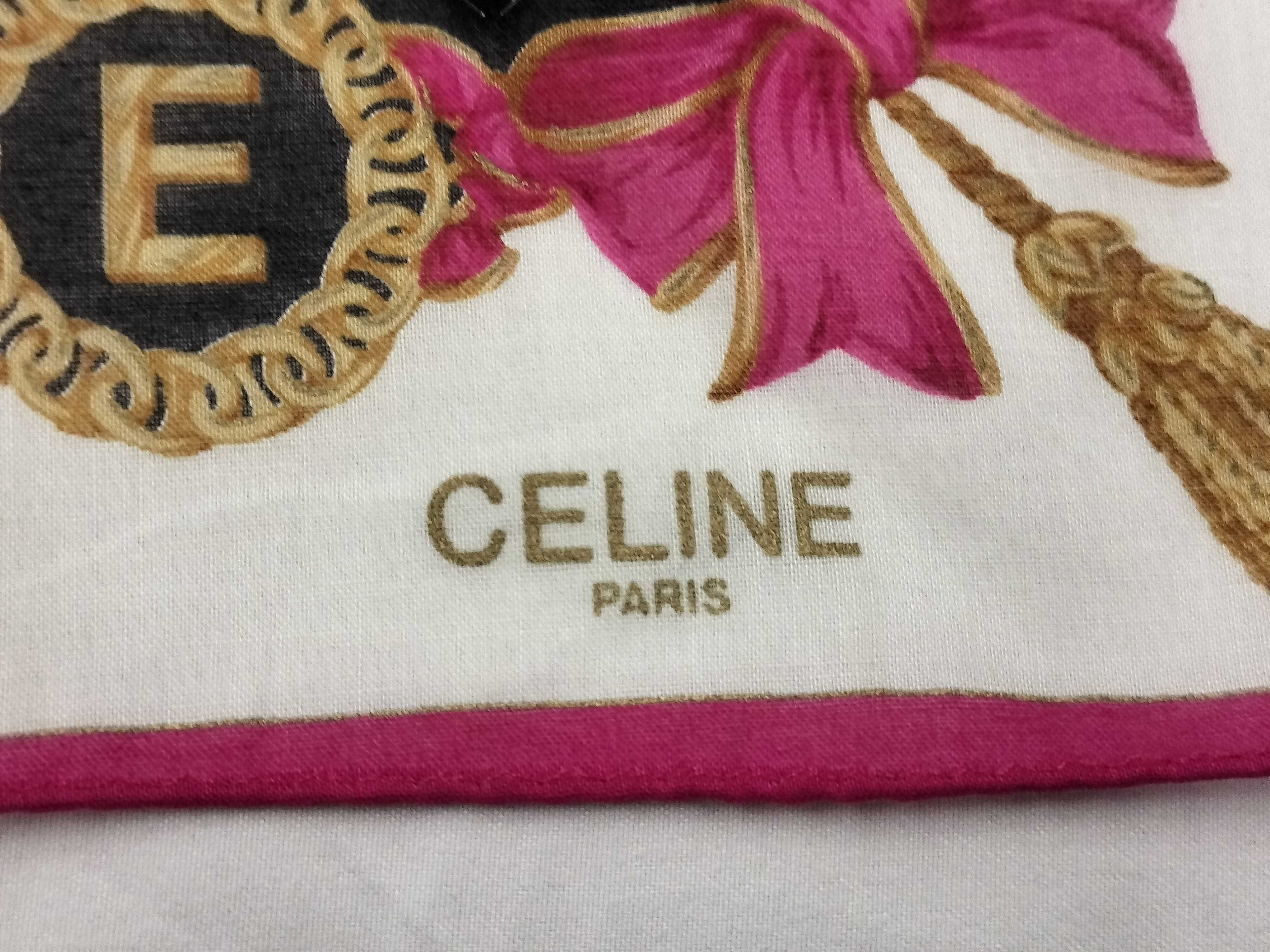handkerchief scarf with sticker, ribbon, tassel, logo, and other accessories. — view 3
