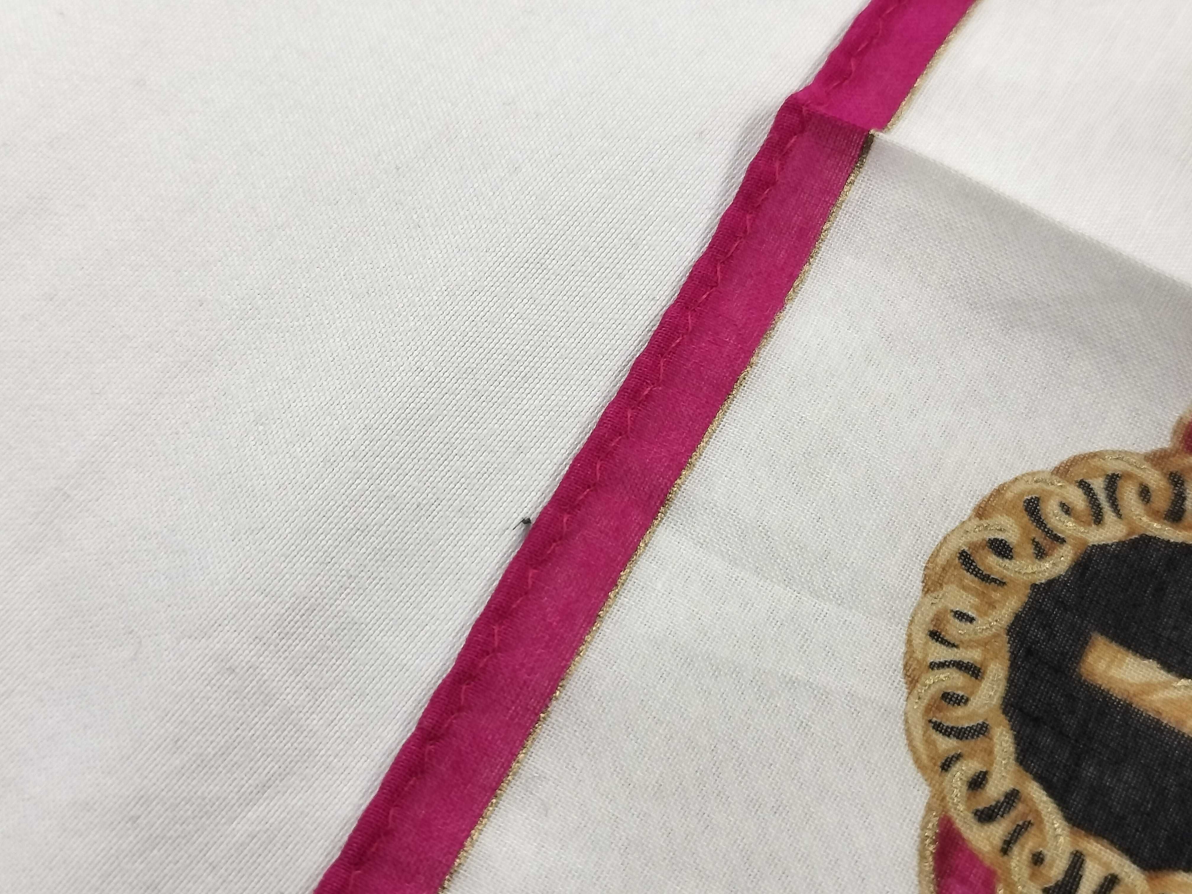 handkerchief scarf with sticker, ribbon, tassel, logo, and other accessories. — view 6