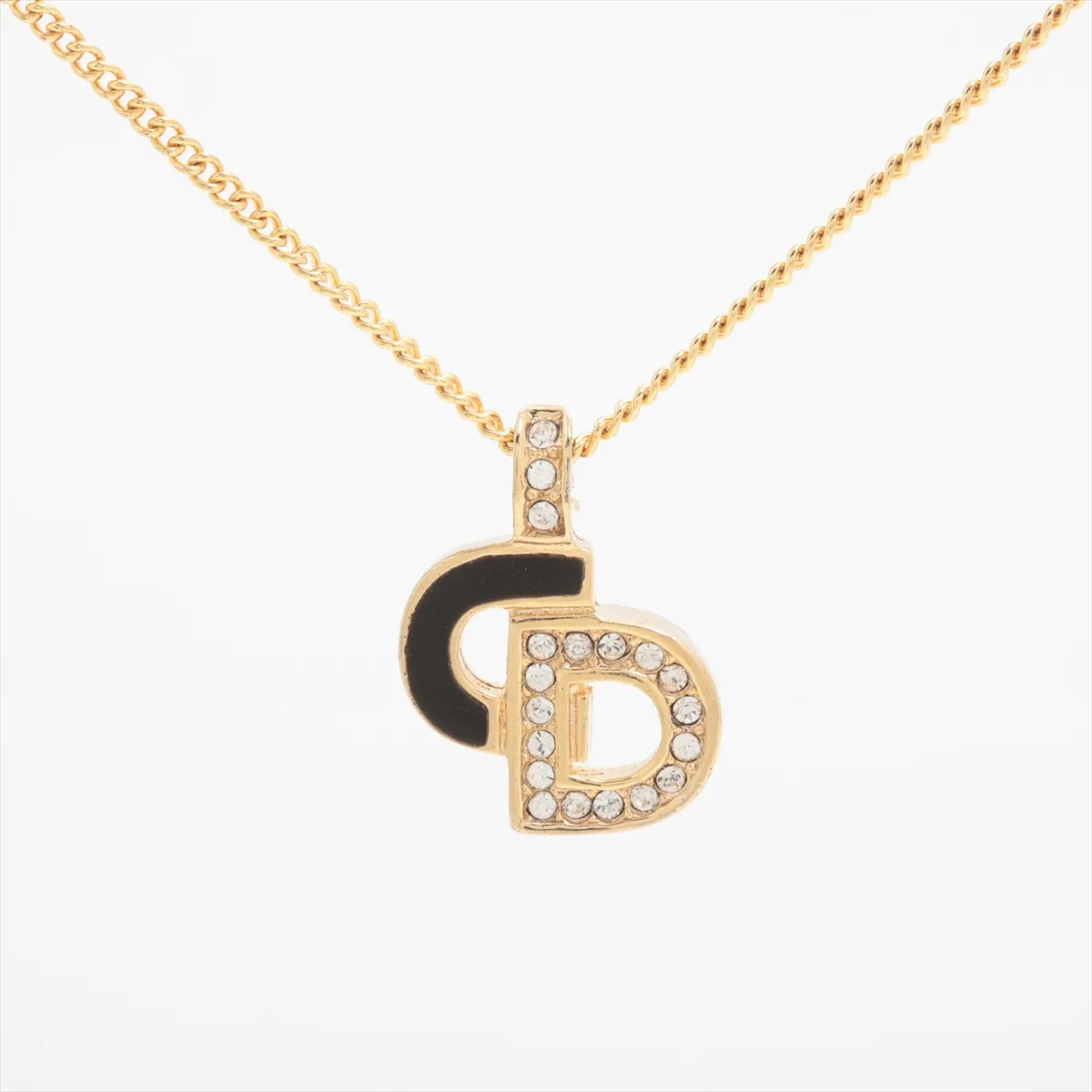 CD logo necklace, GP x rhinestone, black x gold. Shows