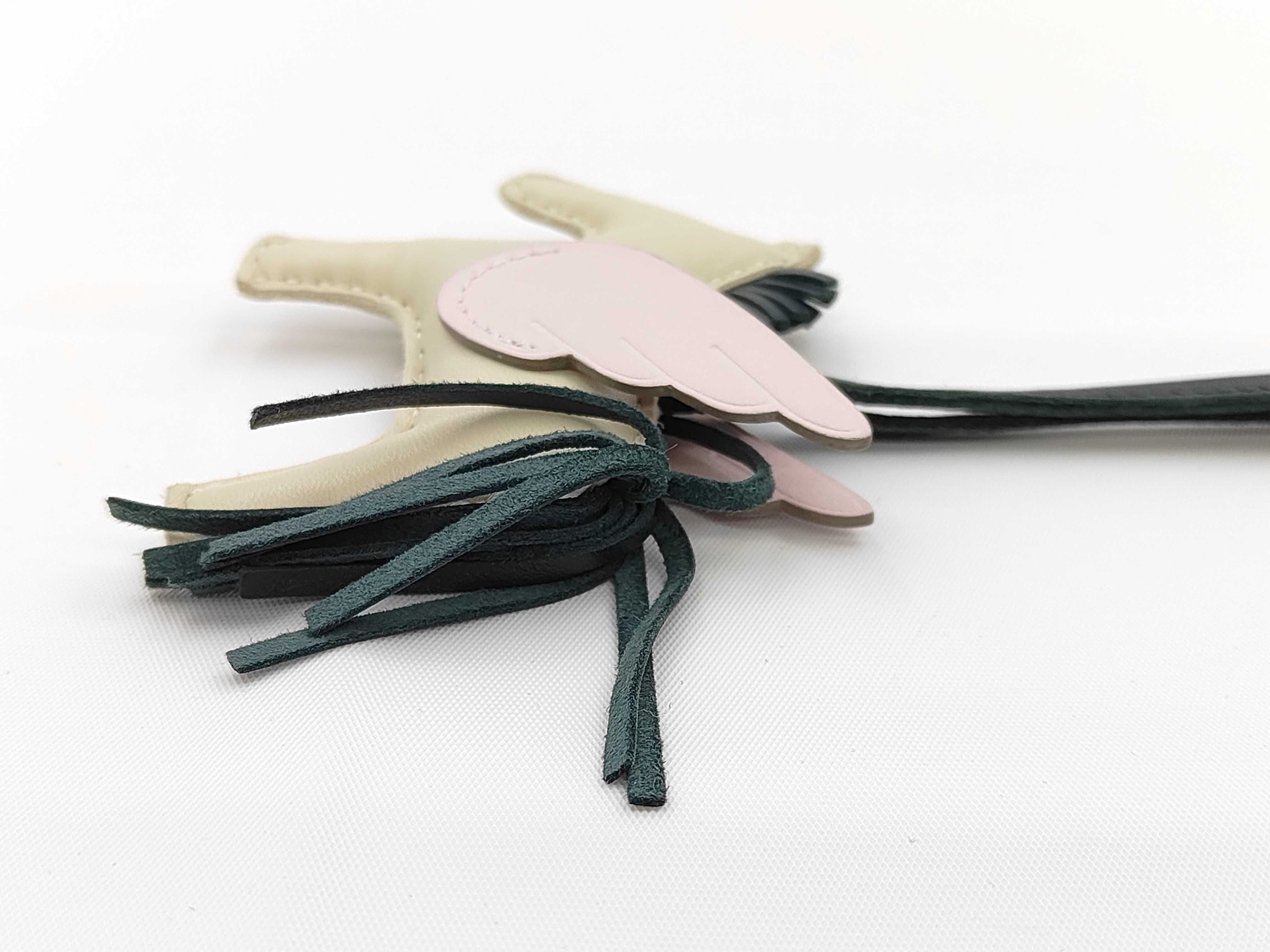 Rodeo Pegasus PM charm, Craie/Vert Cypress/Mauve Pale, U stamp, and other accessories. — view 3