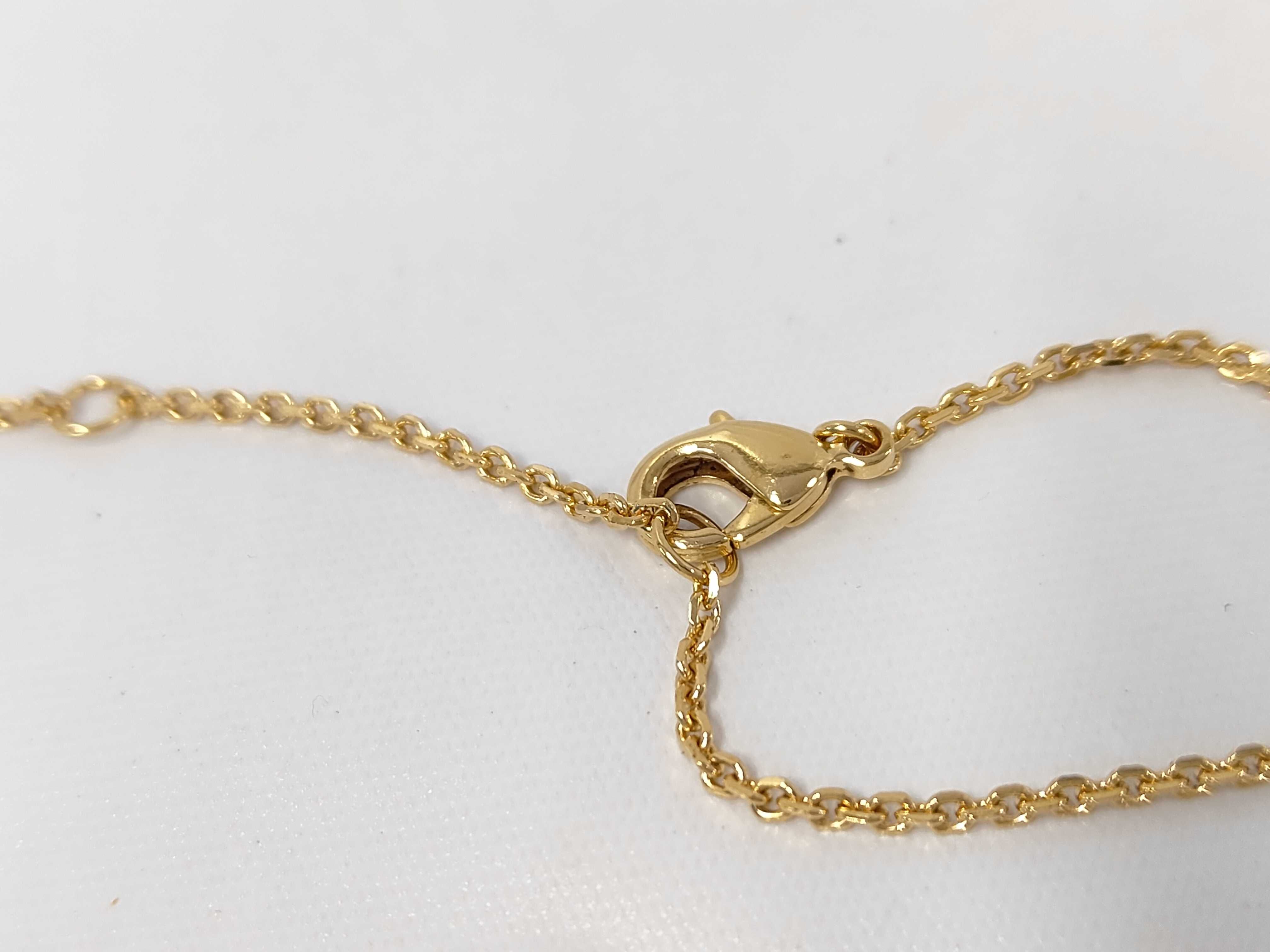 necklace with logo, pearl, and gold accents. — view 5