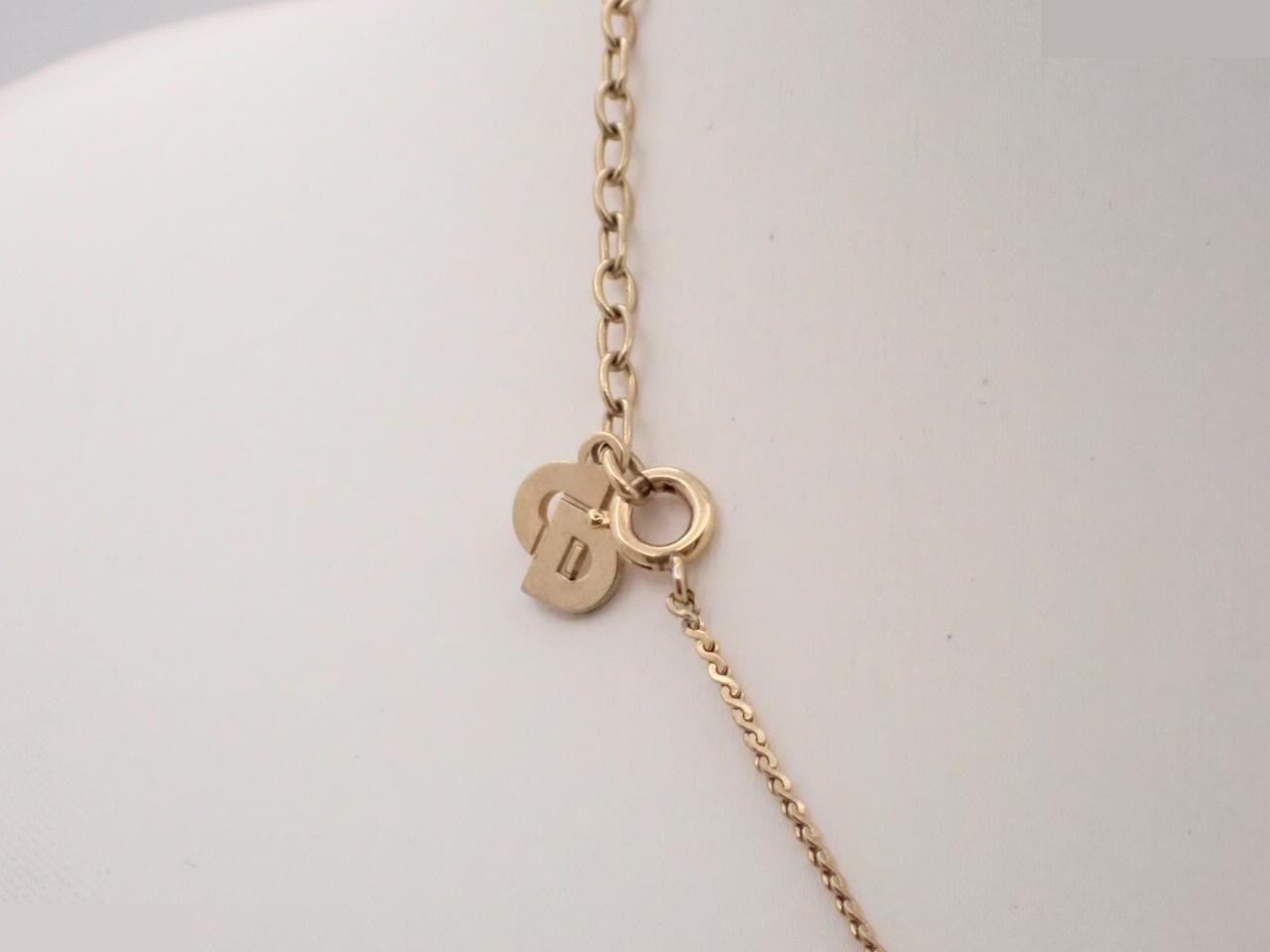 Other lines: Precious metals, necklaces, logo, rhinestones, gold. — view 2