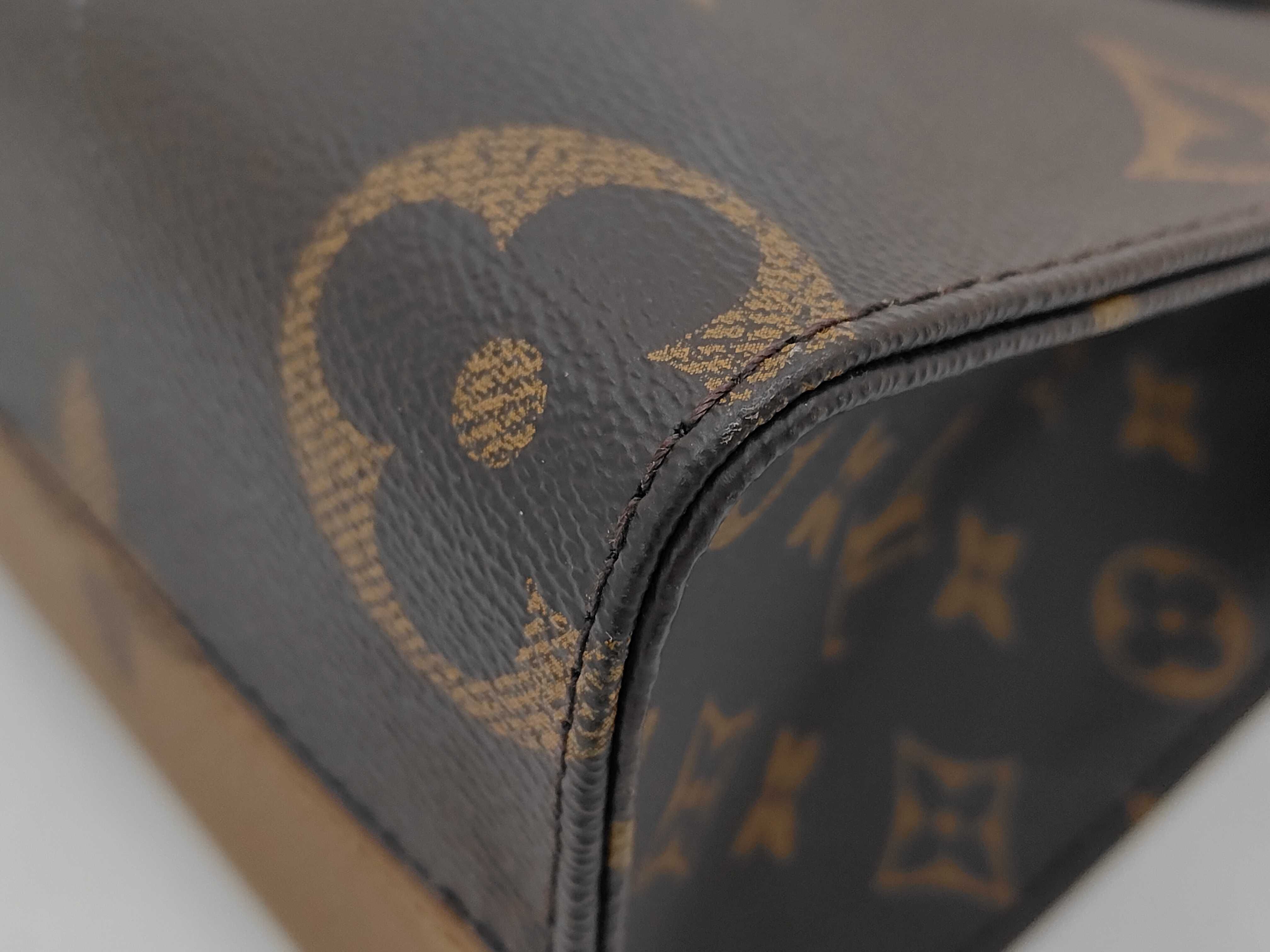 Monogram Giant Reverse OnTheGo PM M46373 Brown RFID Handbag — view 7