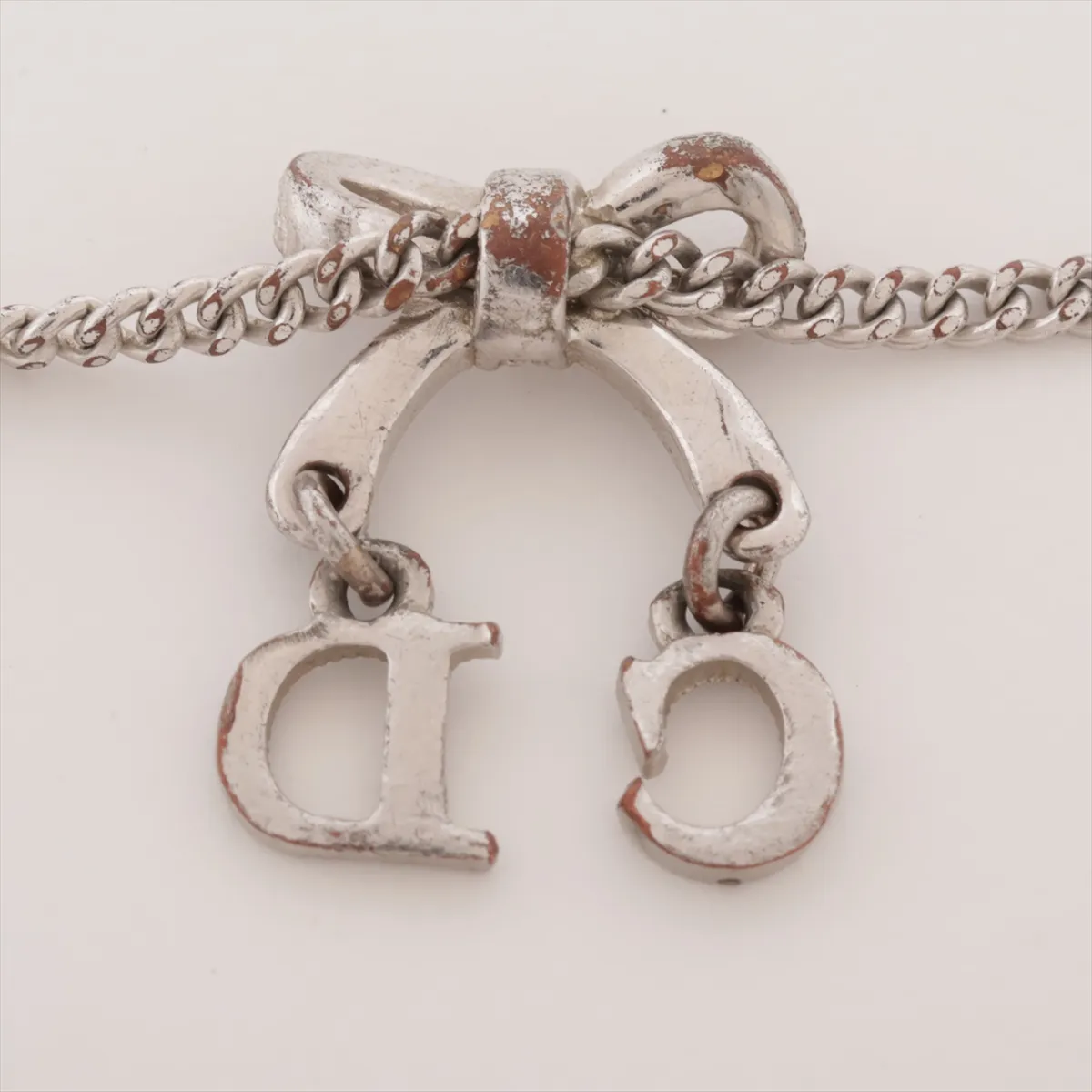 CD Ribbon Bracelet, Metal x Rhinestone, Silver. Shows signs of wear: — view 3