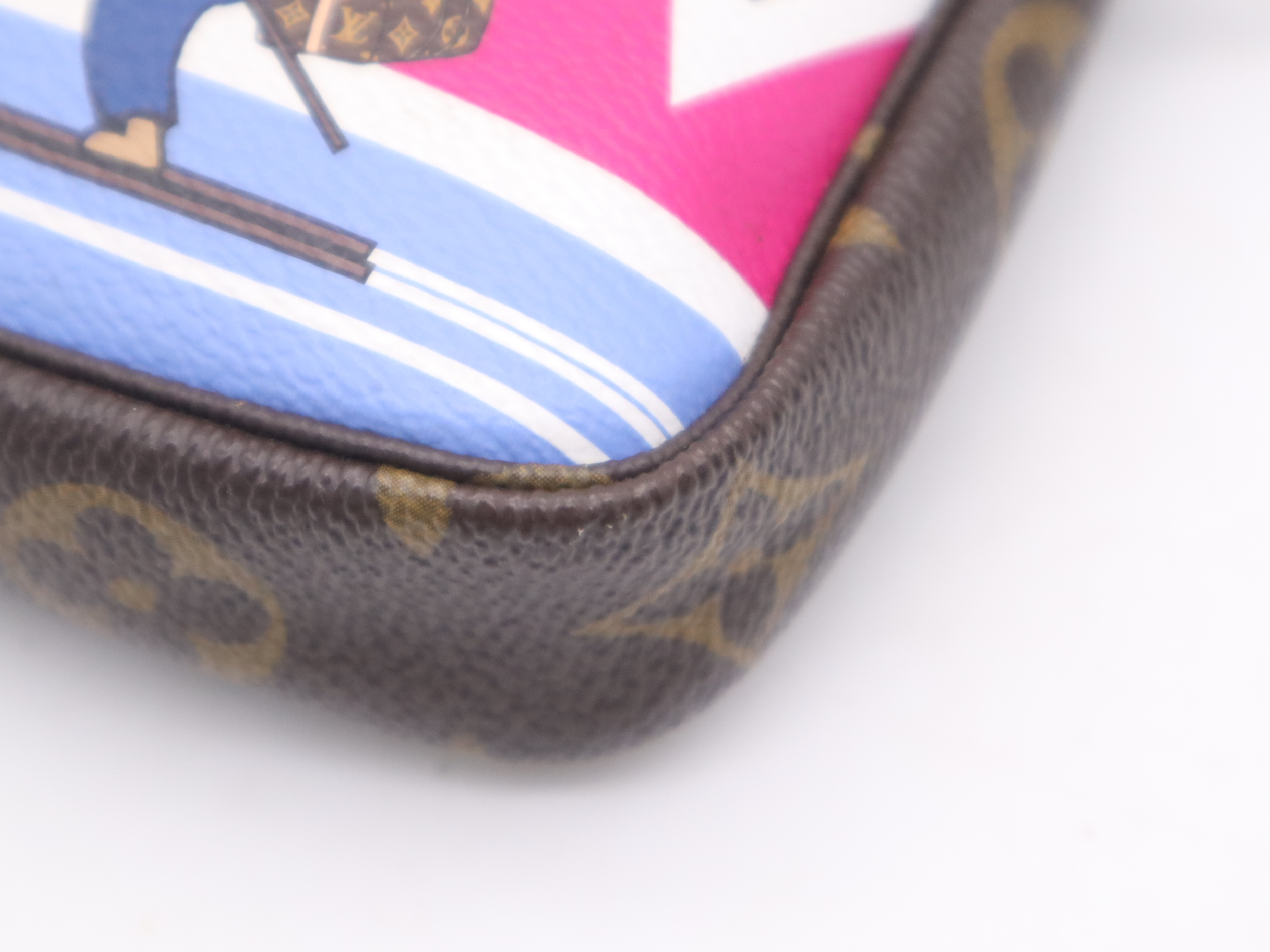 M67769 Monogram Mini Pochette Accessoires Holiday Pouch — view 9