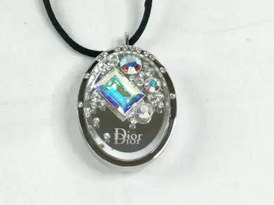 necklace, gloss unused.