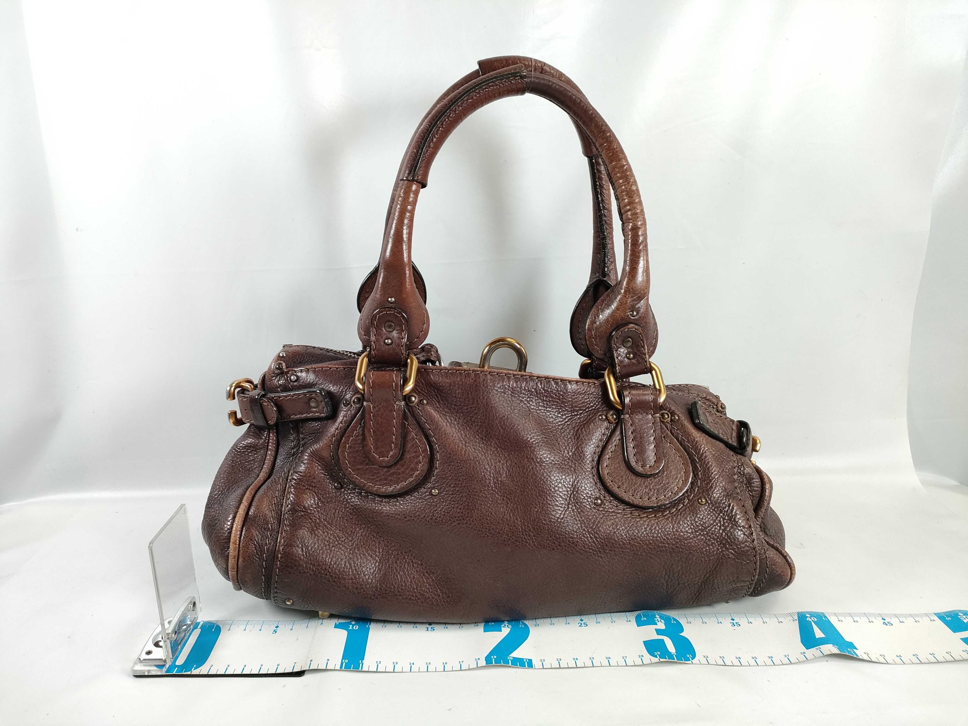 brown handbag — view 2