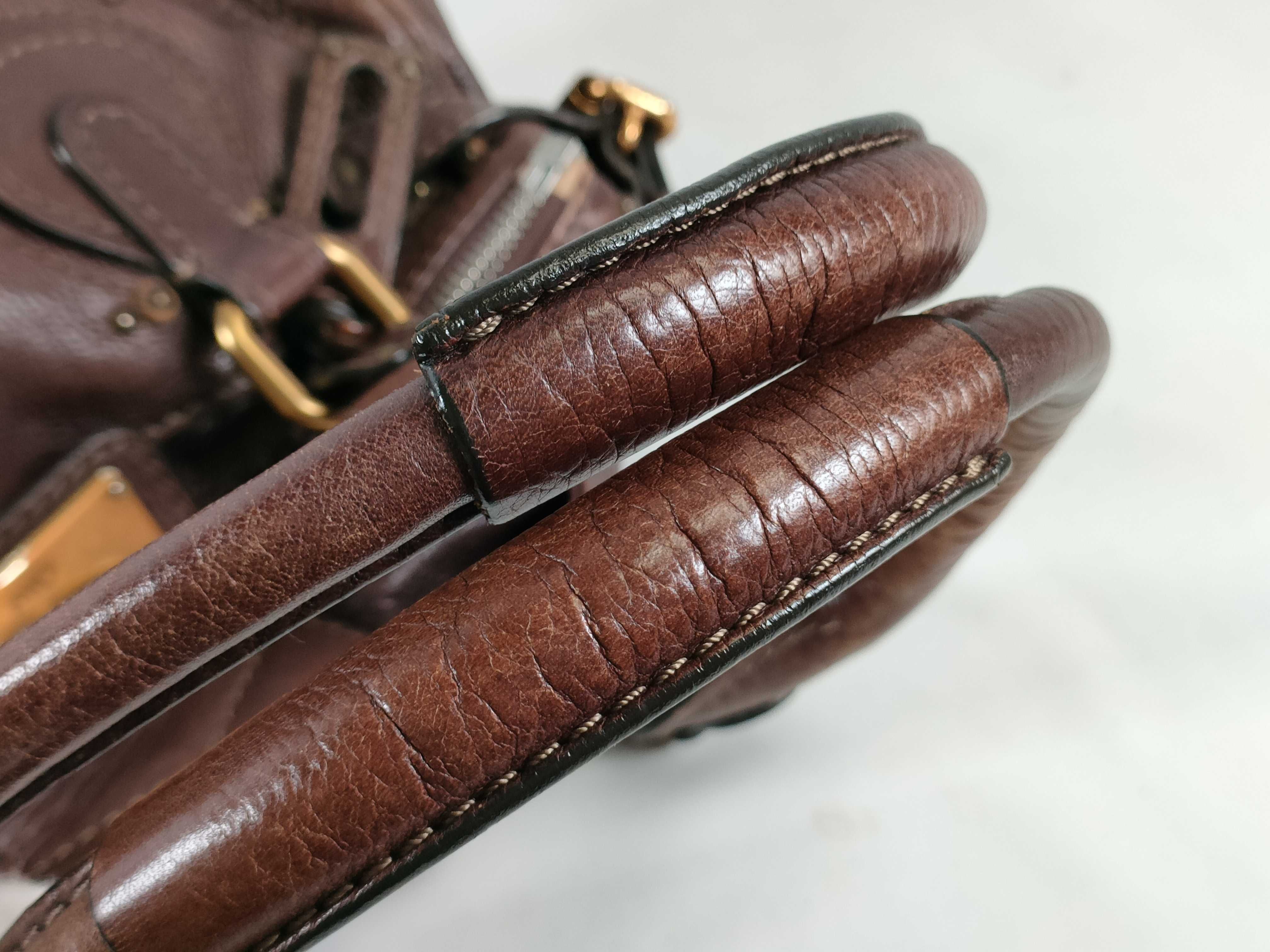 brown handbag — view 4