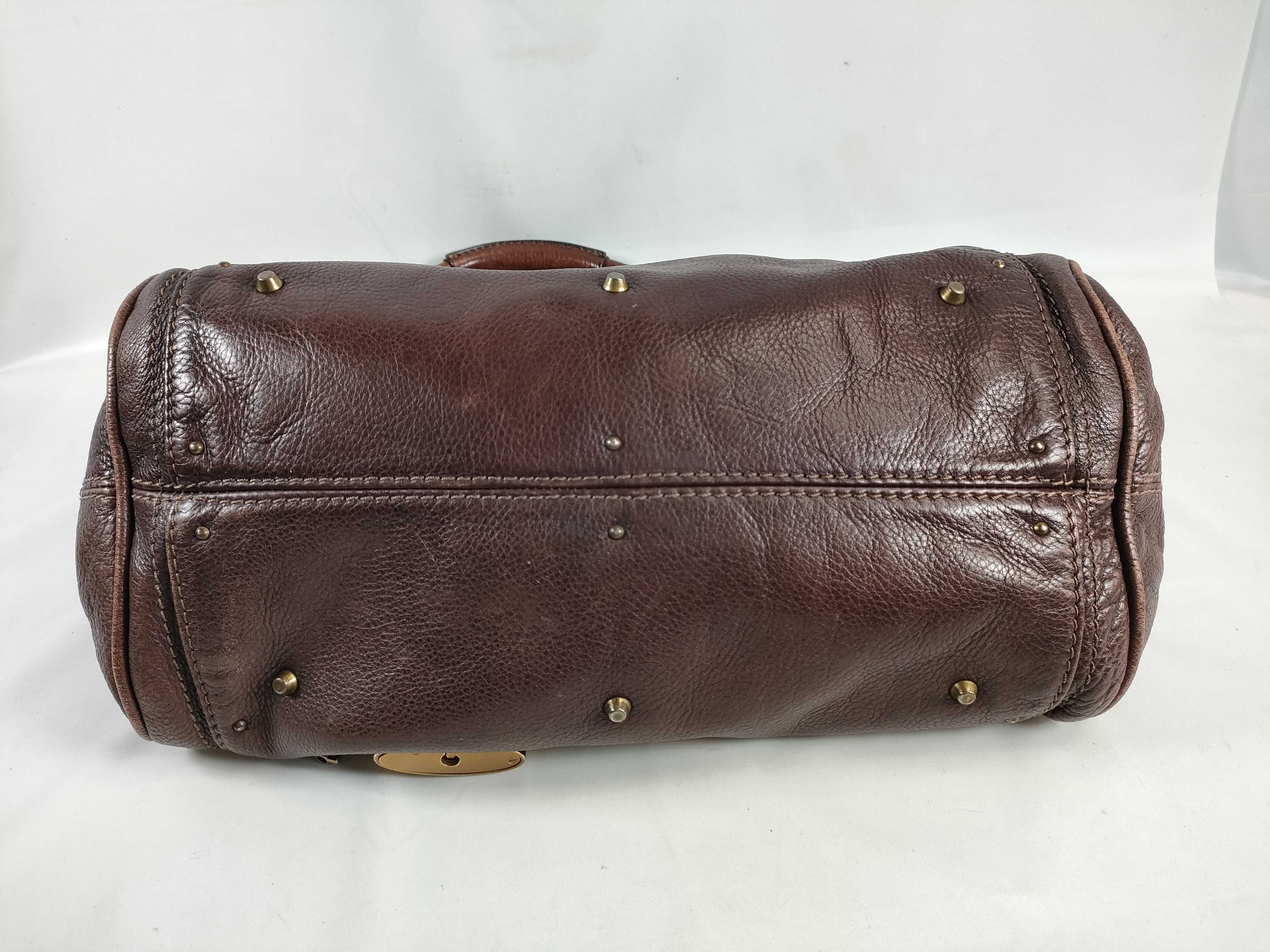 brown handbag — view 7