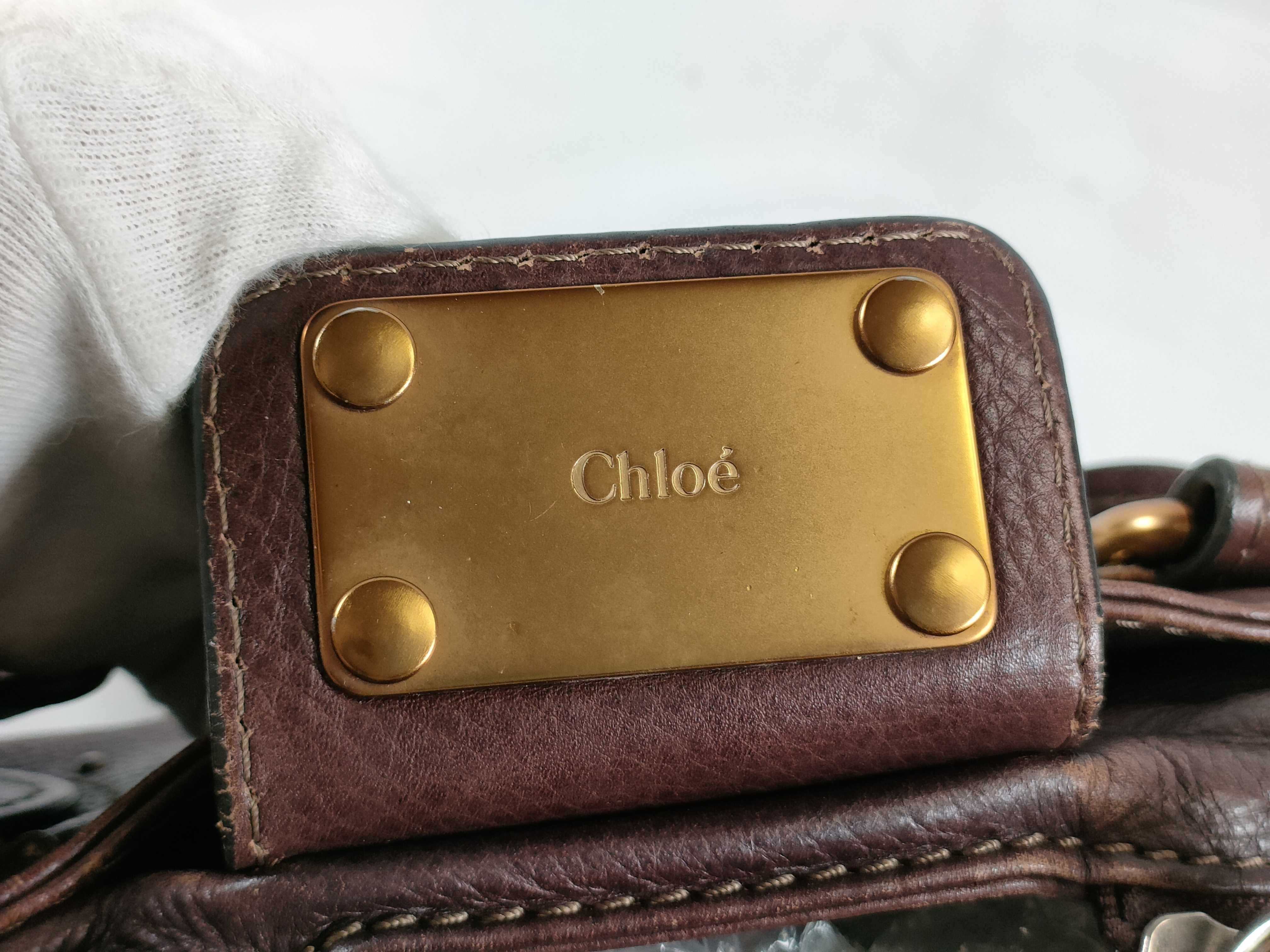 brown handbag — view 8