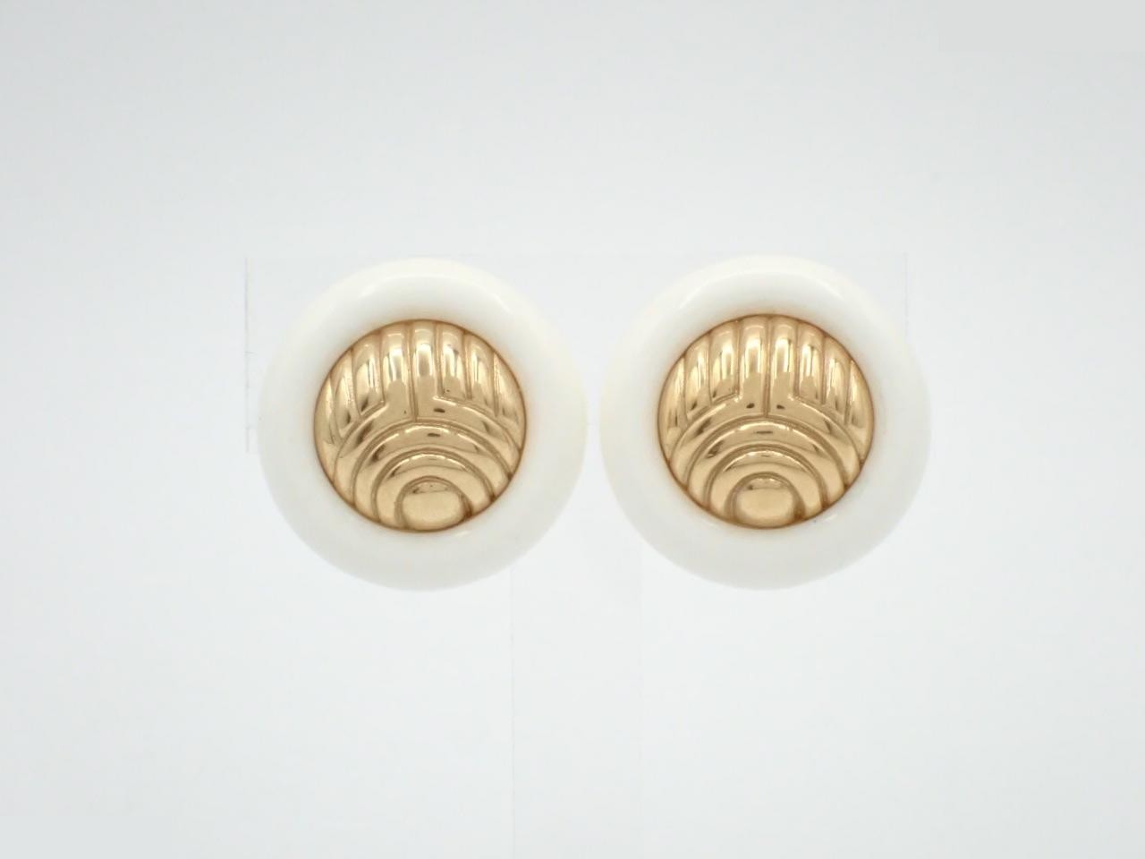 Other lines: Precious metal earrings, circle design, white gold.