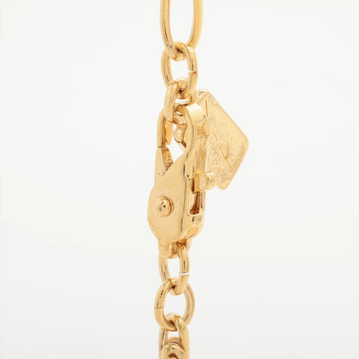 necklace, gold plated with rhinestones. Shows signs of wear, tarnishing, and stains. — view 3