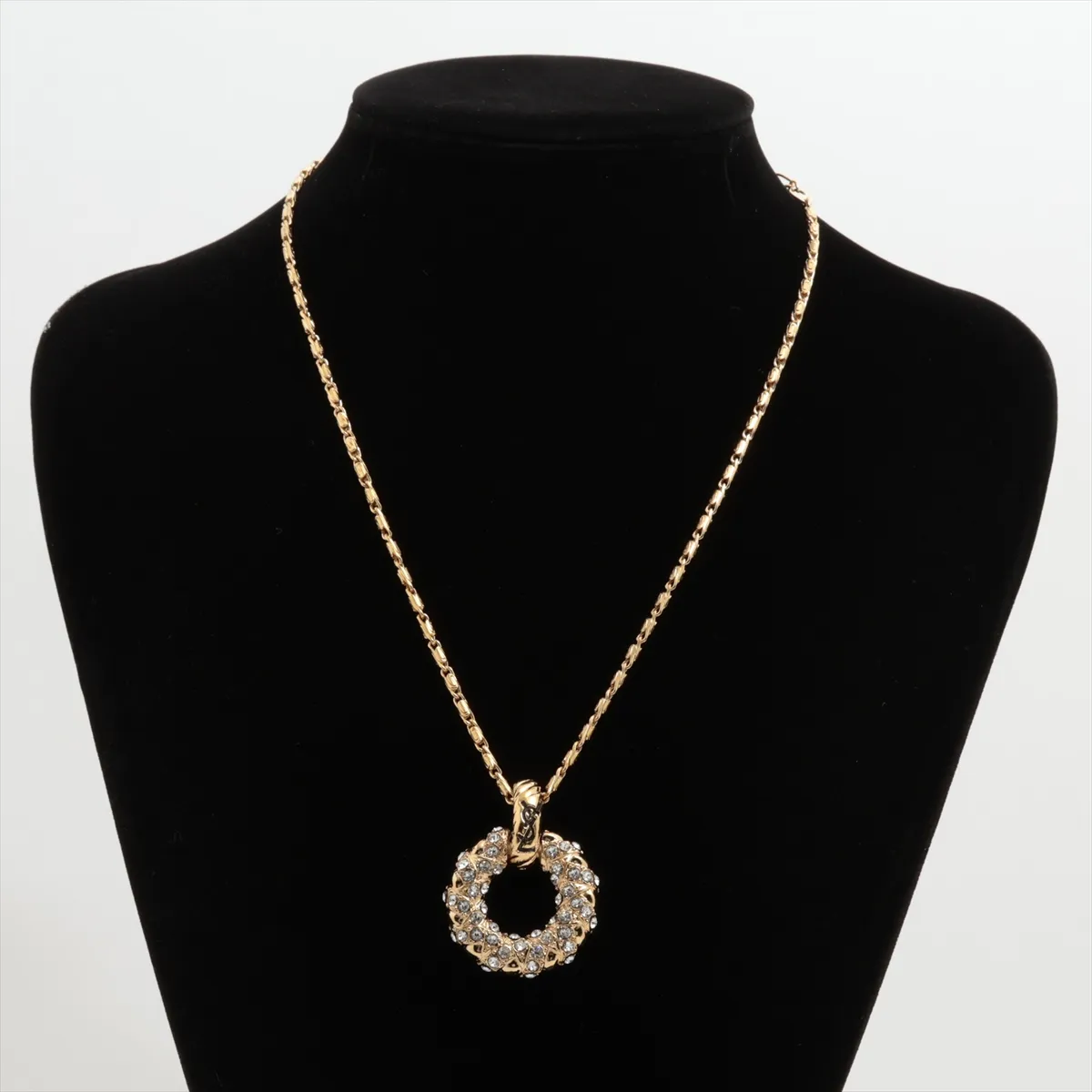 necklace, gold plated with rhinestones. Shows signs of wear, tarnishing, and stains. — view 5