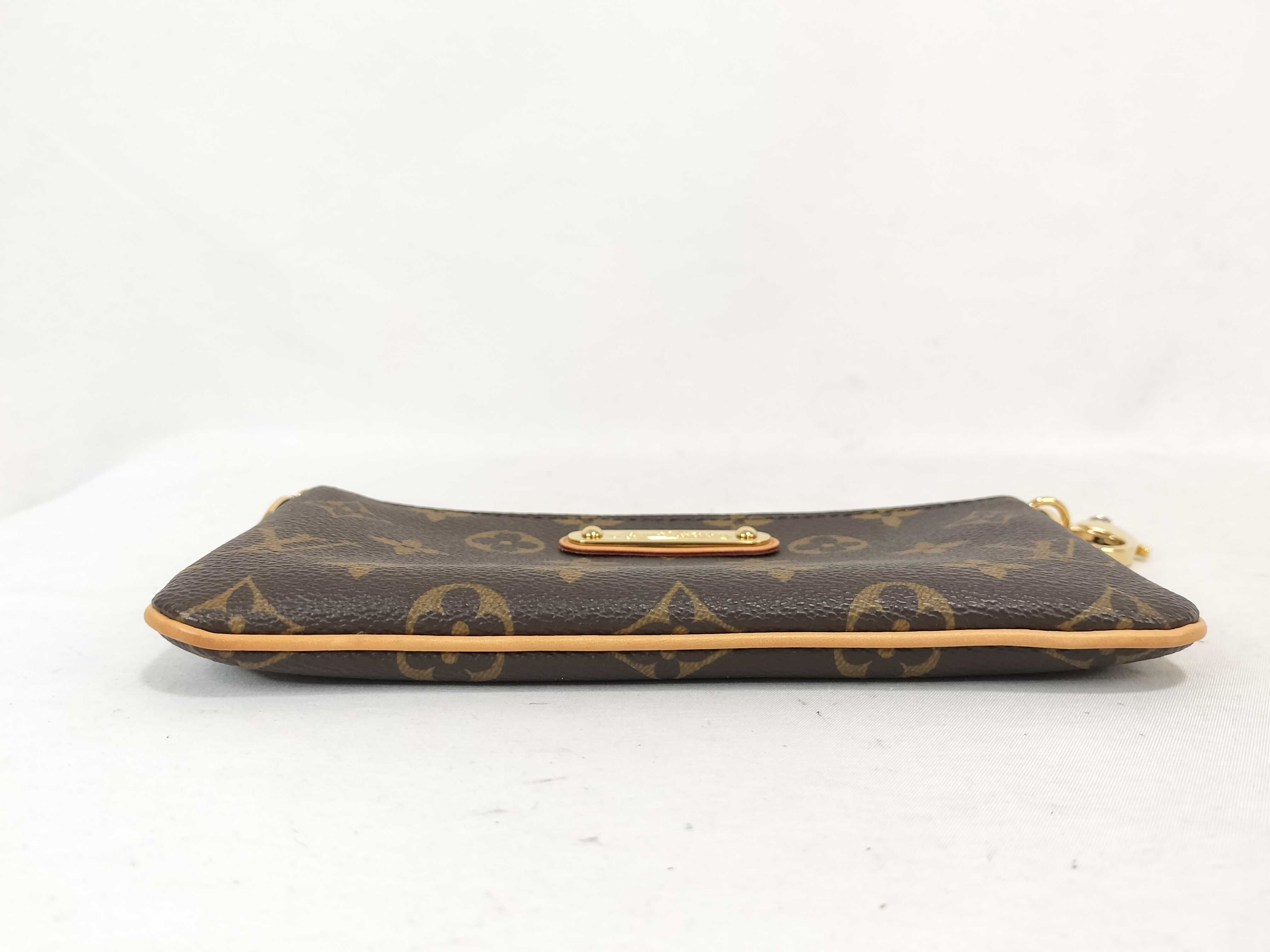 Monogram Louis Vuitton Monogram Pochette Mila MM Handbag — view 8