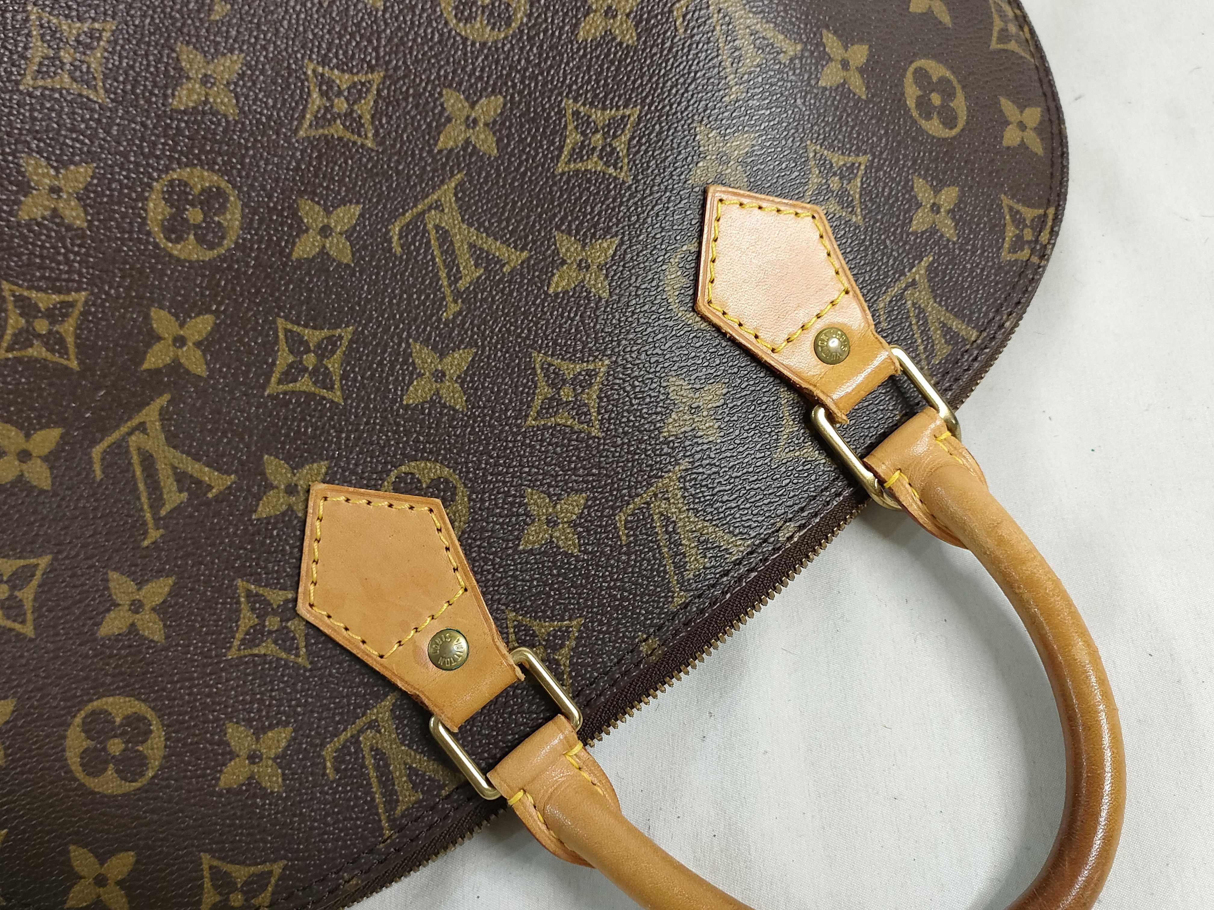 Monogram Alma M51130 Brown Handbag — view 15