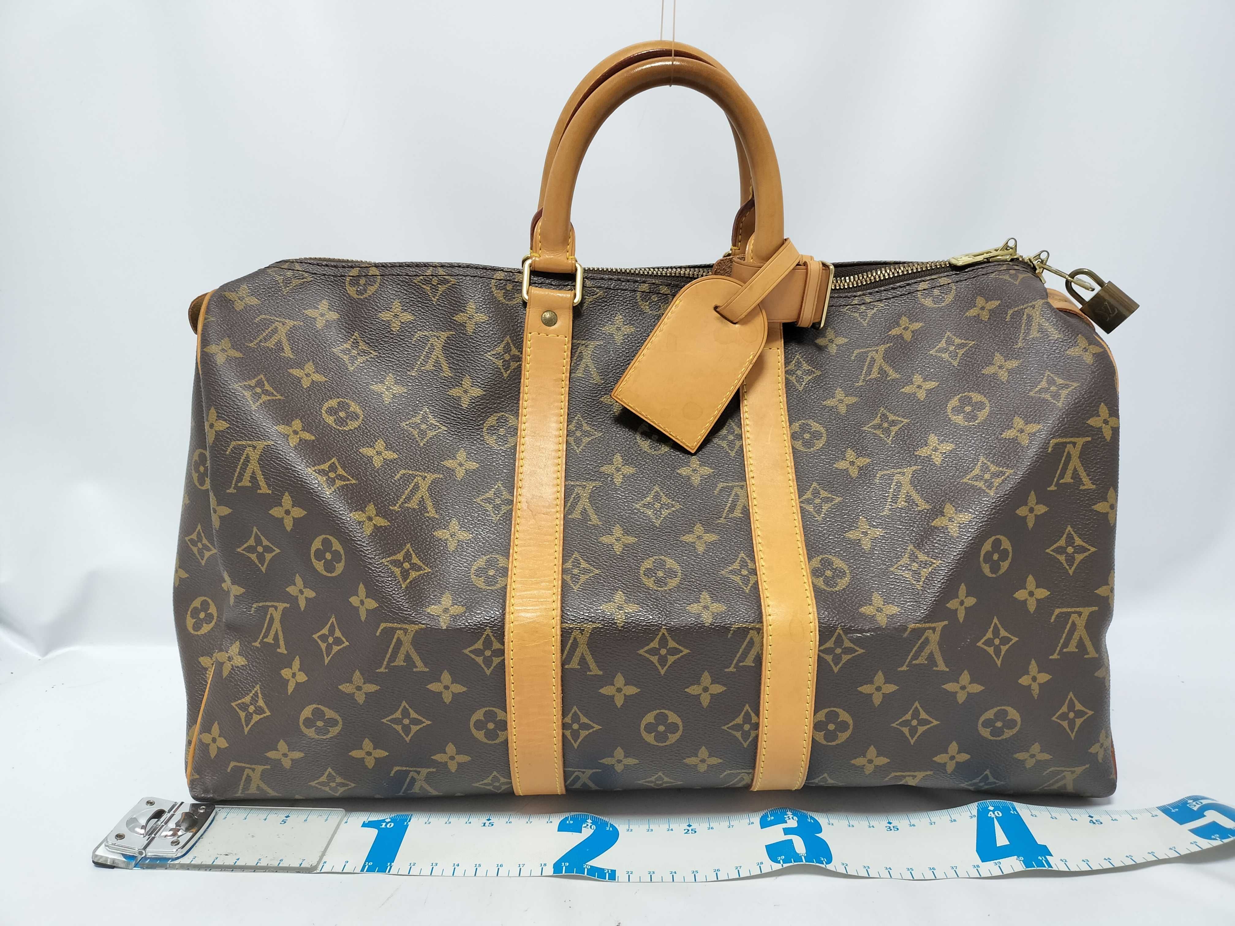 Monogram LOUIS_VUITTON M41428 Keepall 45 SP0936 Boston bag with padlock, name tag, and handle strap. — view 2
