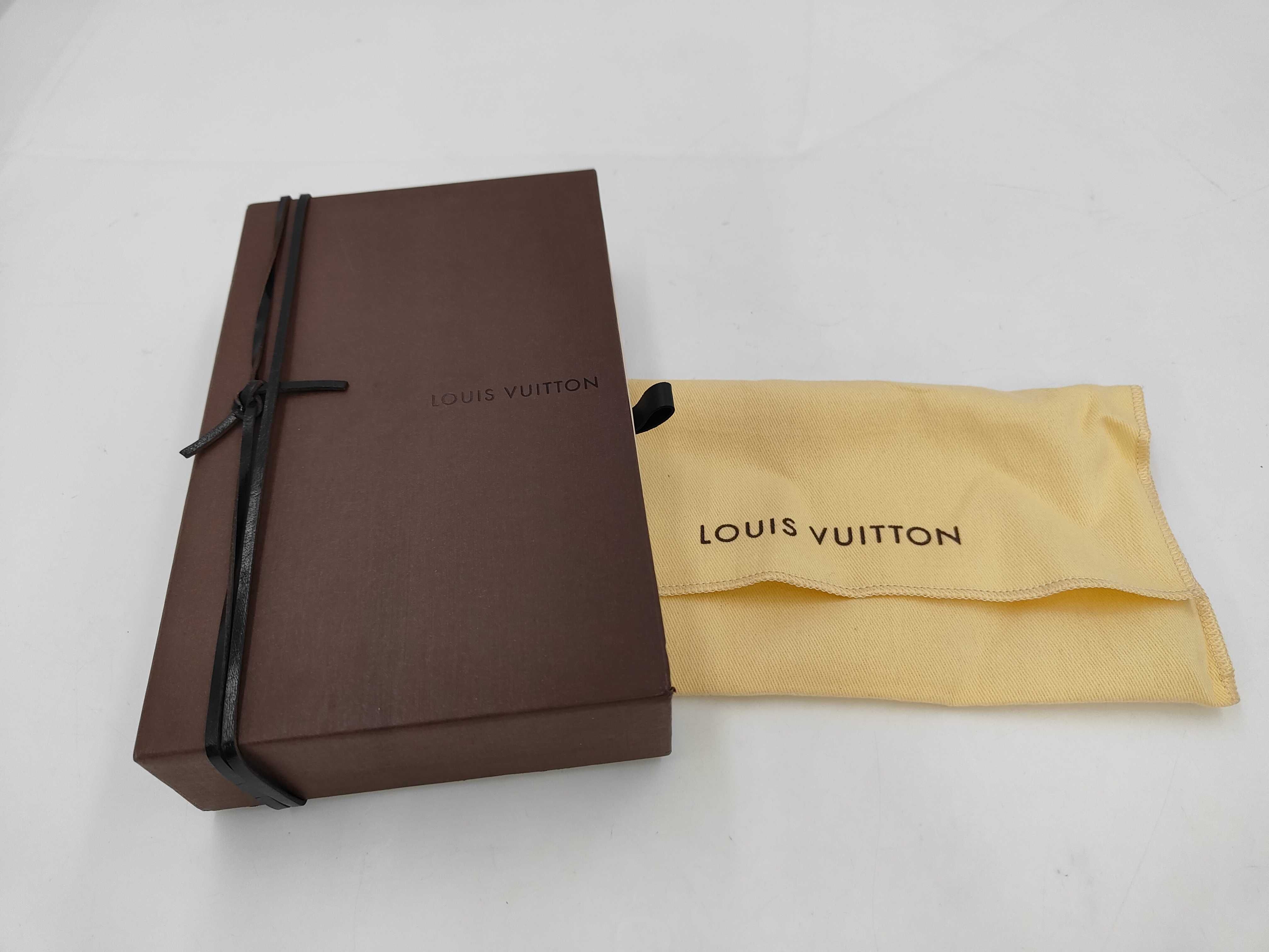 Monogram Etoile / Portefeuille Sarah / M66556 / Long Wallet / PVC Wallet — view 13