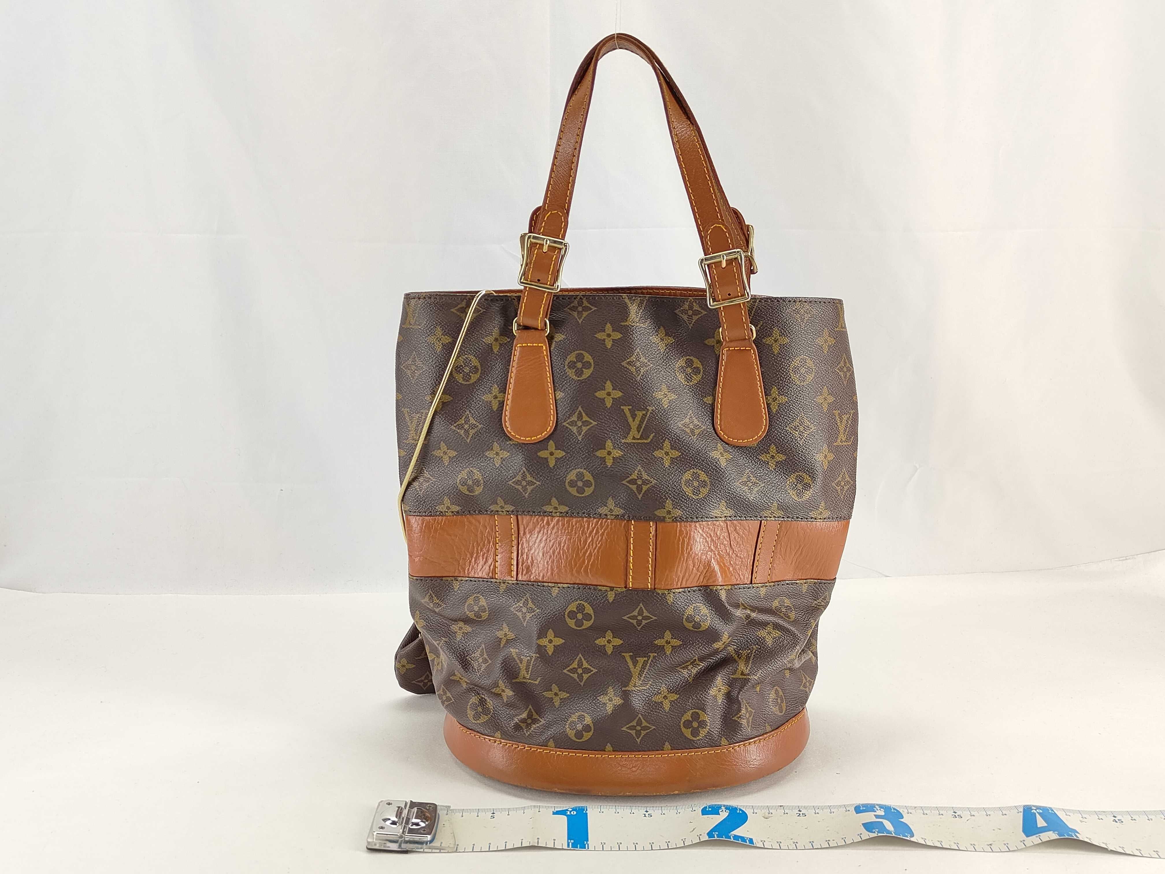 Monogram Louis Vuitton Monogram Made in USA Bucket GM Tote Bag with coin purse, after aftermarket repairs — view 2