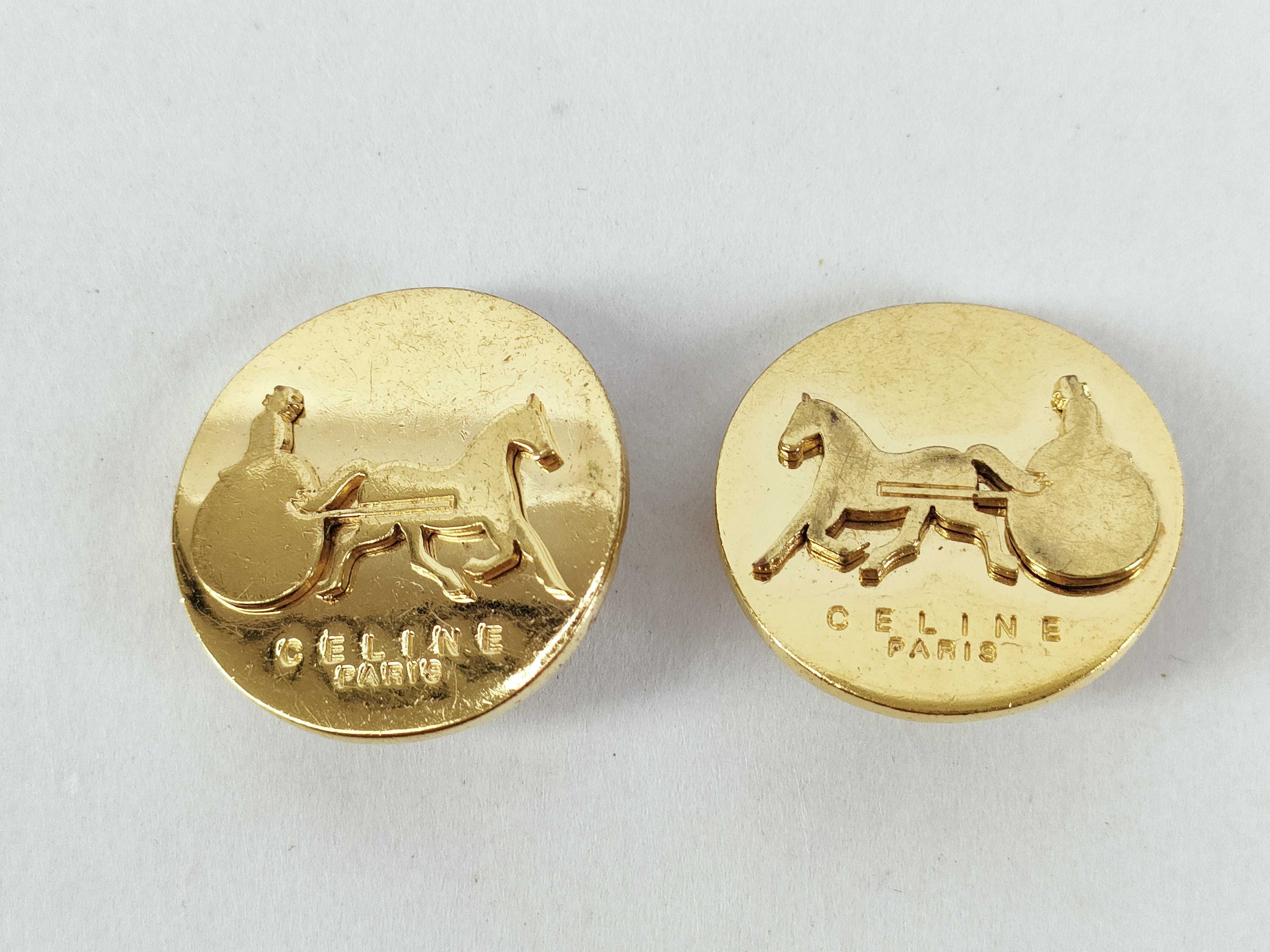 earrings, gold, carriage motif.