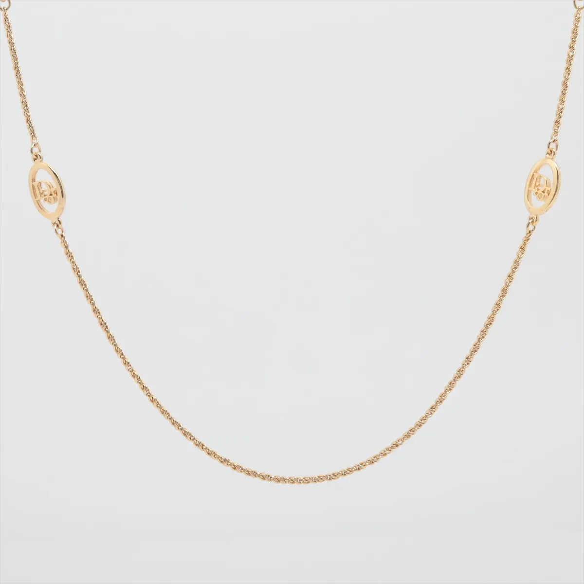 logo necklace, GP gold. Shows