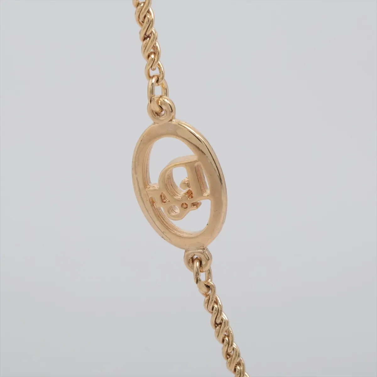 logo necklace, GP gold. Shows — view 3