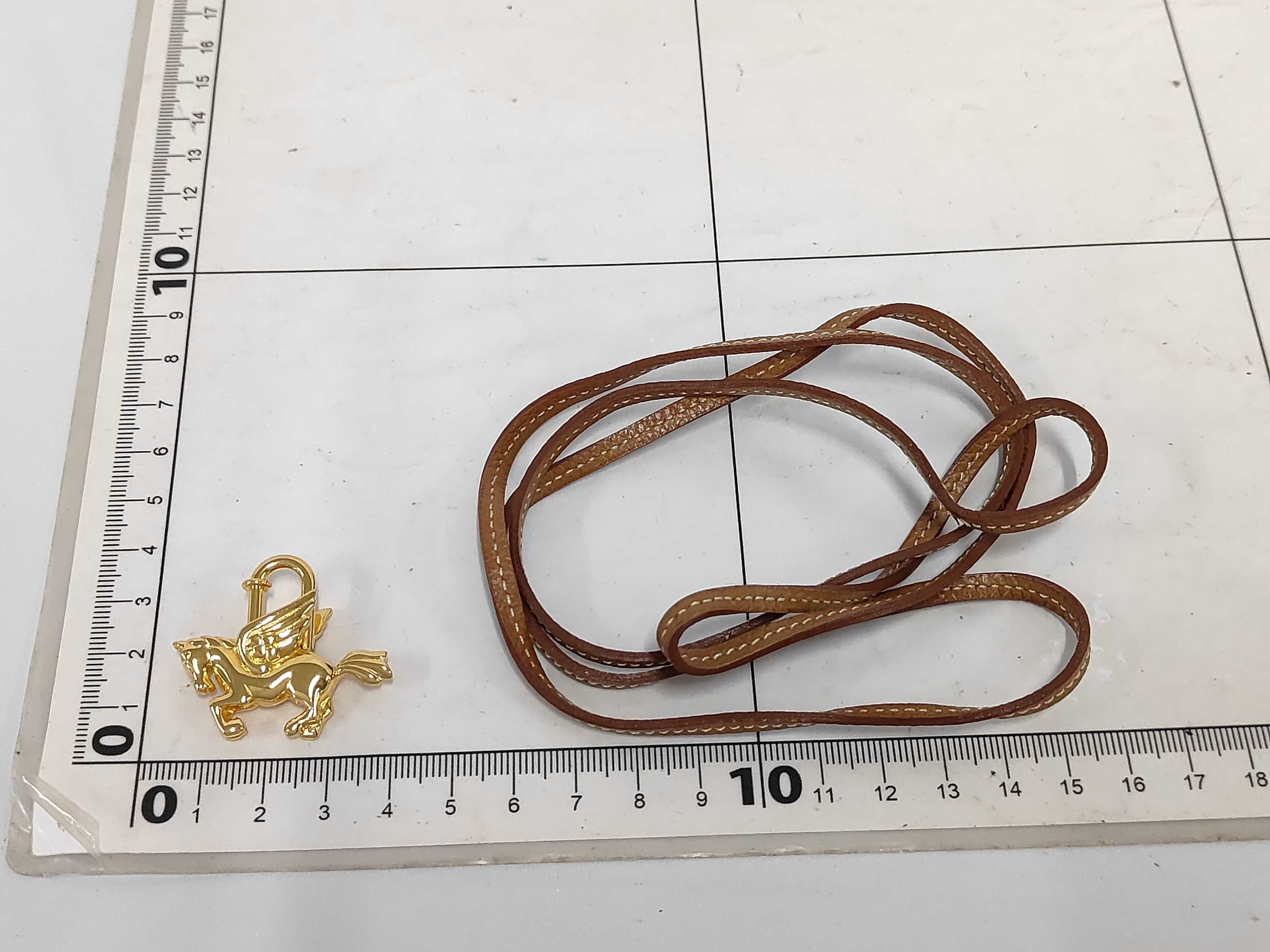 Pegasus Cadena Gold Charm and other accessories — view 2