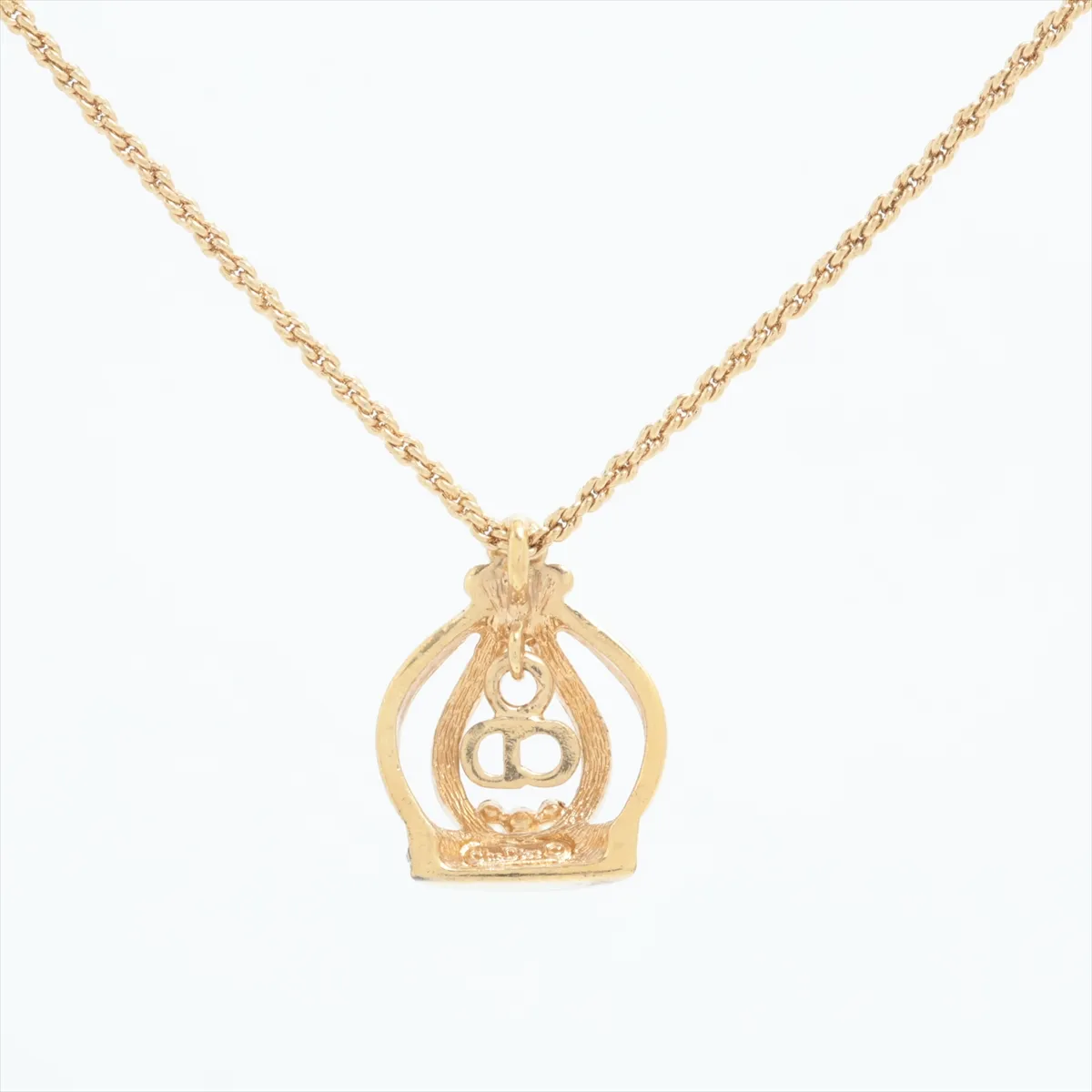 CD logo necklace, gold plated with rhinestones. Shows signs of wear, — view 2