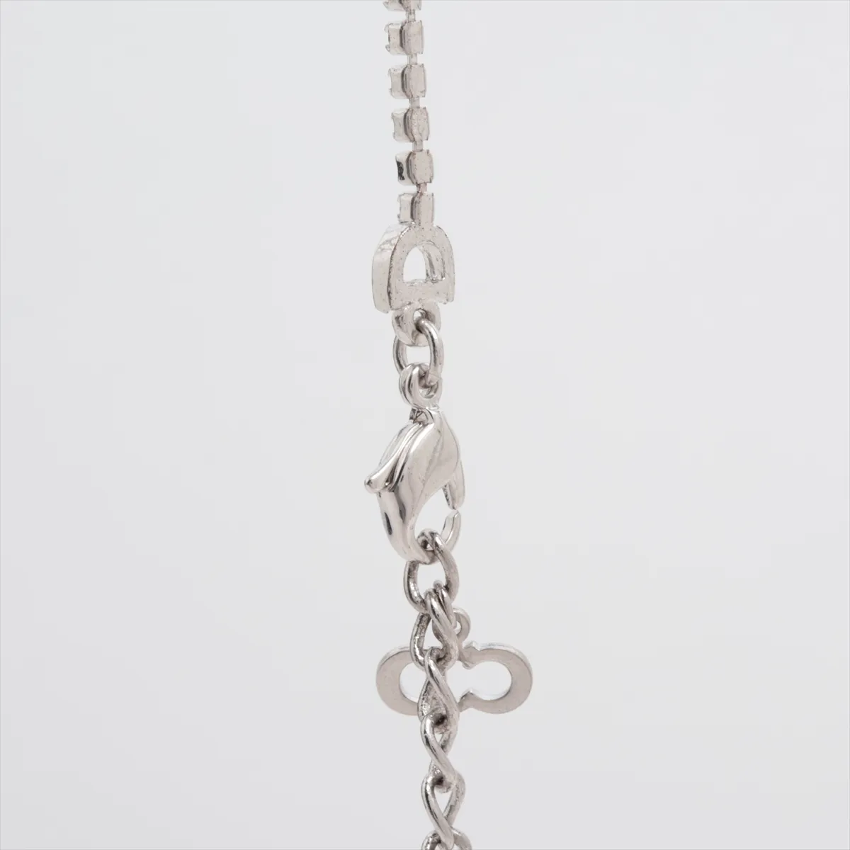 logo necklace, gold plated with rhinestones, silver. There are dents, — view 3