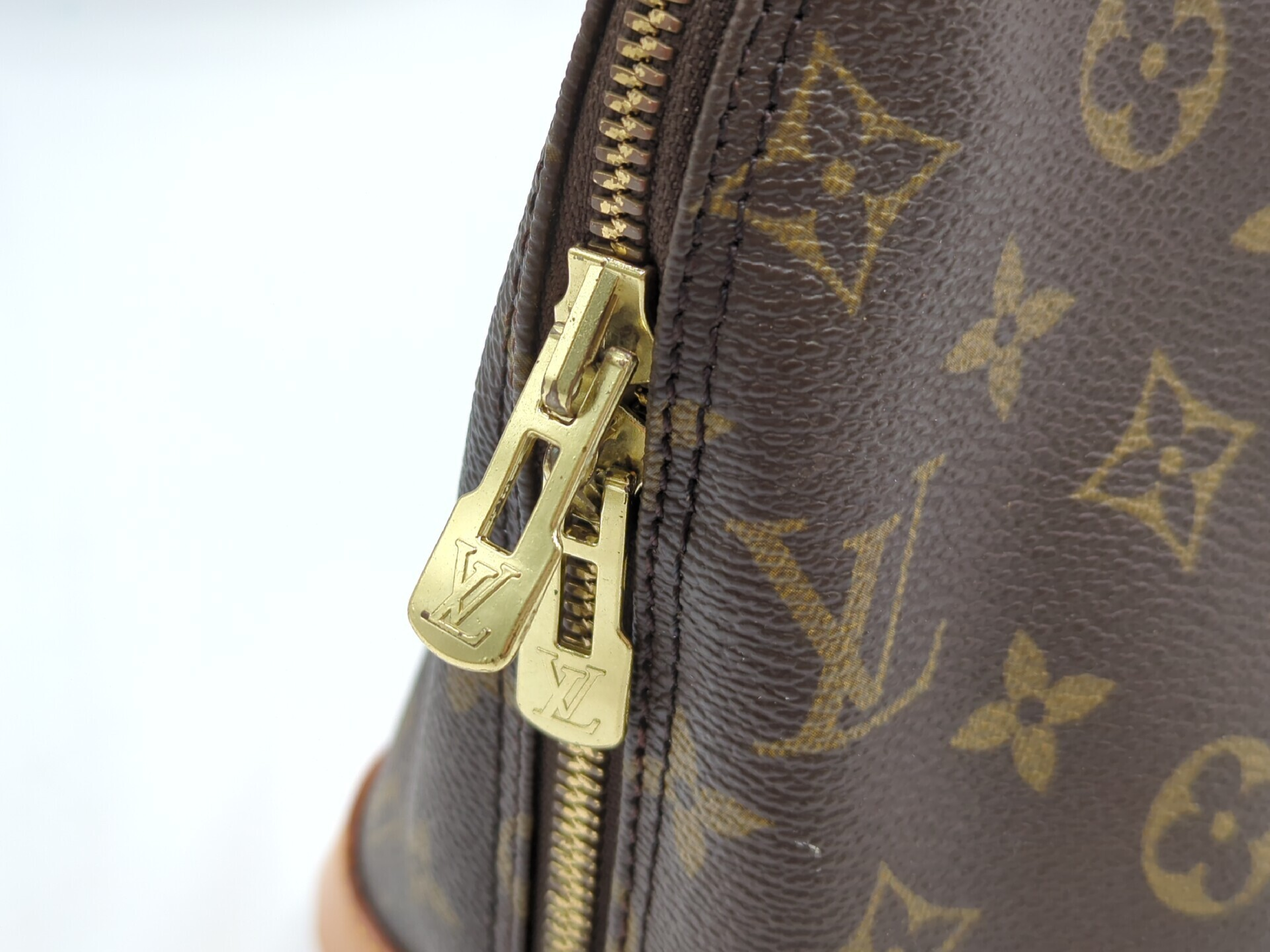 M51130 Monogram Alma Handbag — view 9