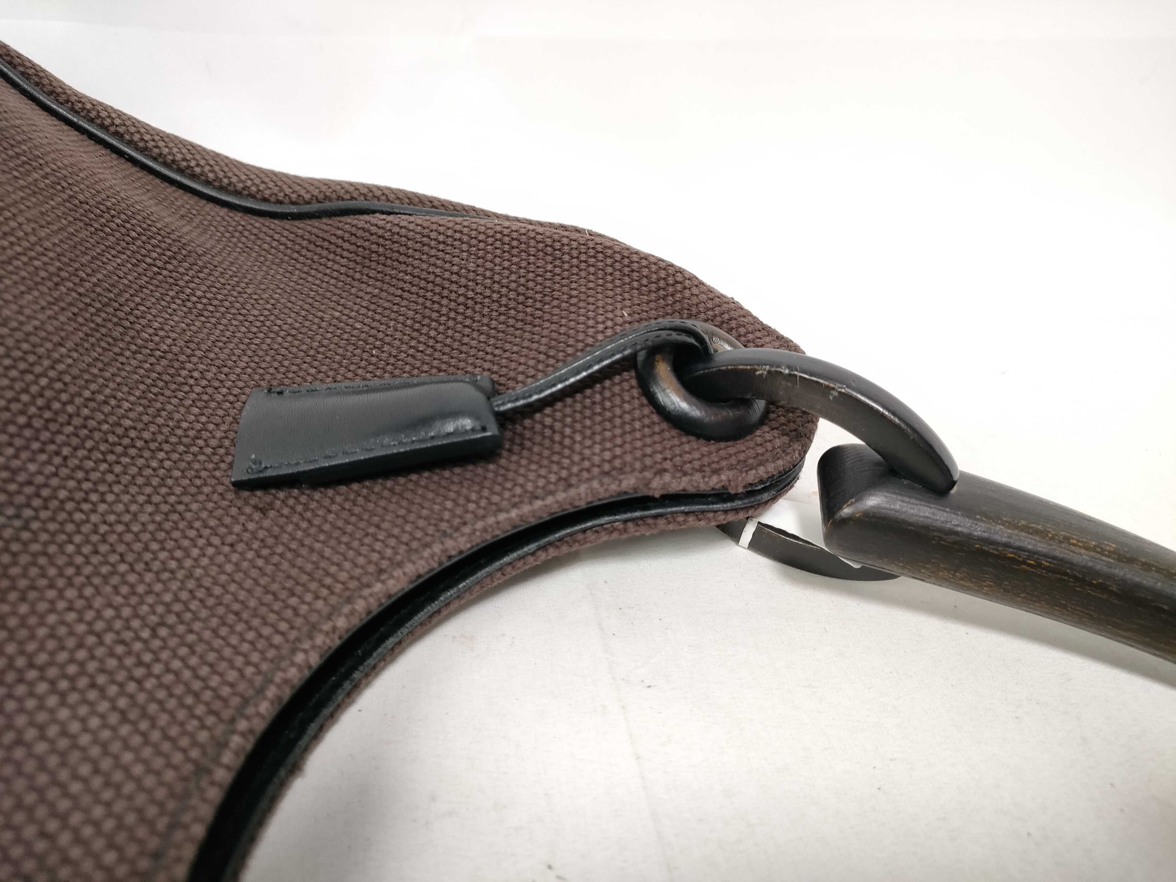Brown GG Canvas Wooden-Handle Wrist Bag — view 10