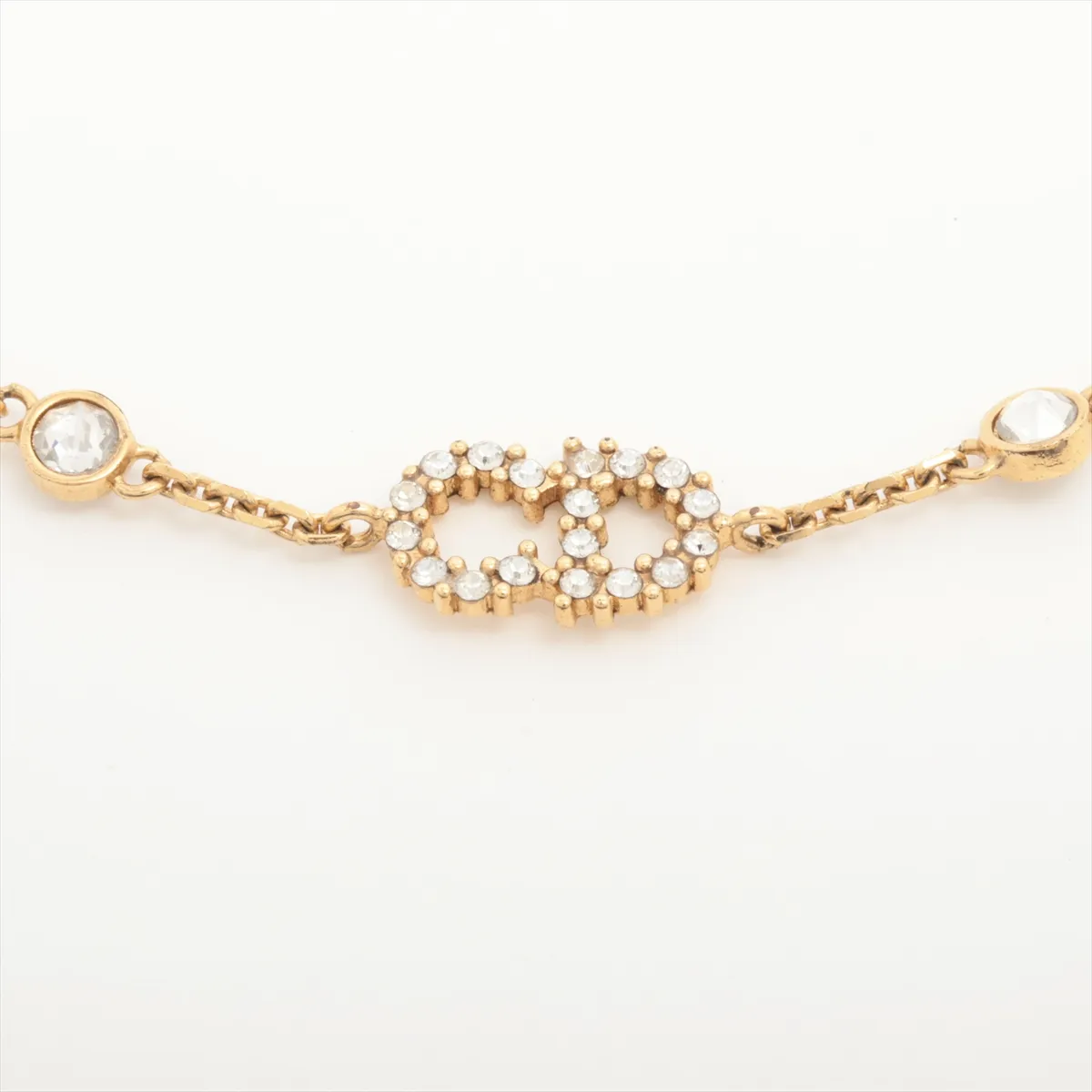 Clair D Lune bracelet, gold-plated with rhinestones and faux pearls. Shows signs of wear including — view 2