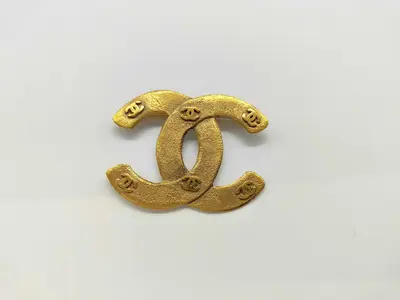 Brooch with Box, featuring six Coco Marks within a Coco Mark design.