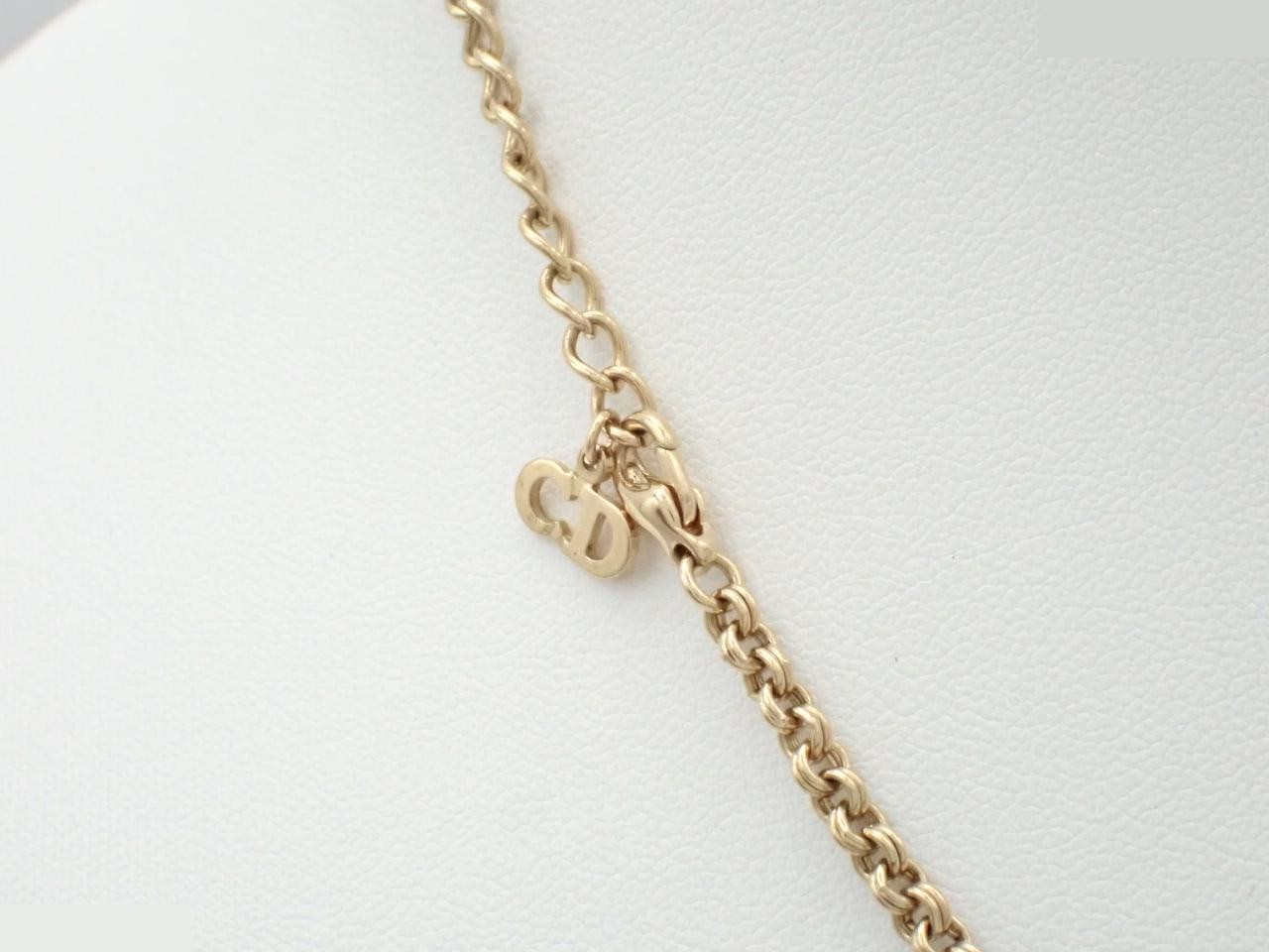 Gold necklace with stone; chain approximately 40cm long. — view 2
