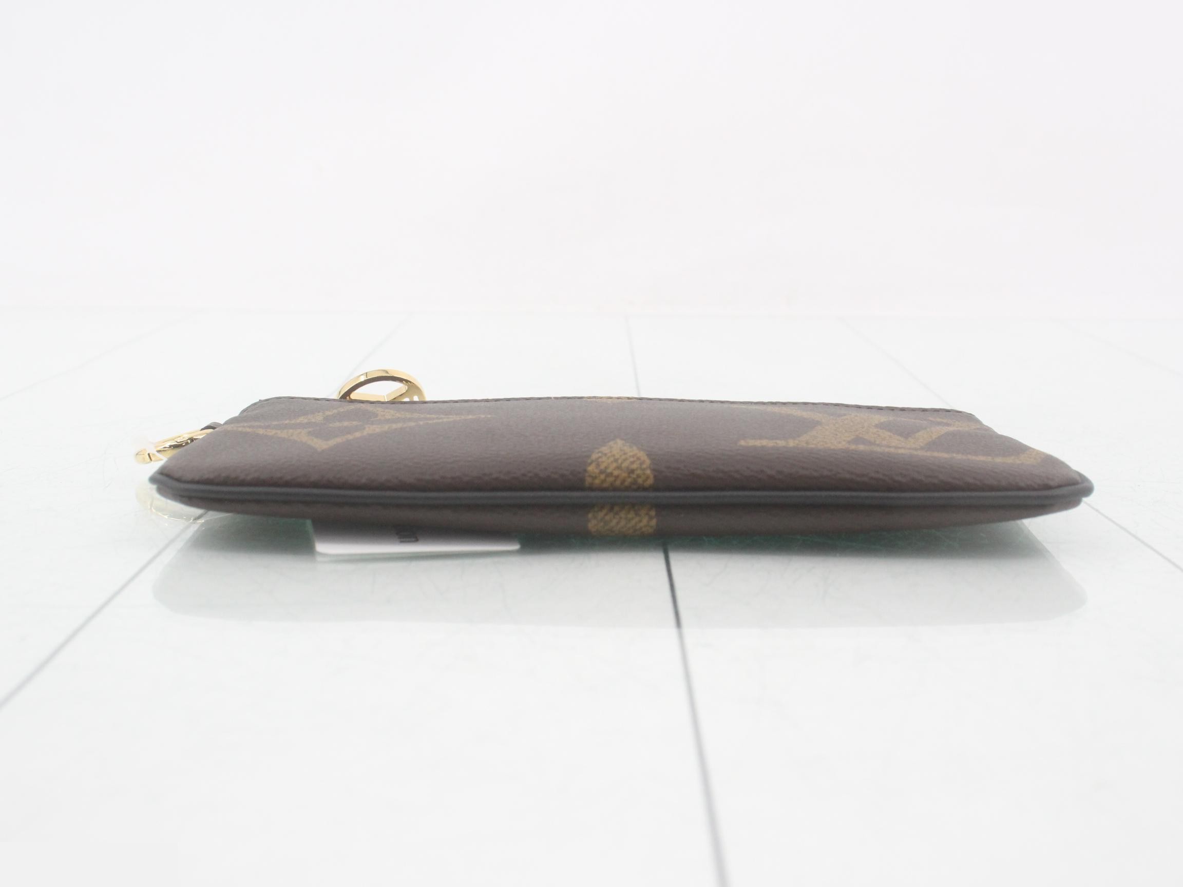 Monogram Giant Reverse Pochette Trio Pouch — view 3