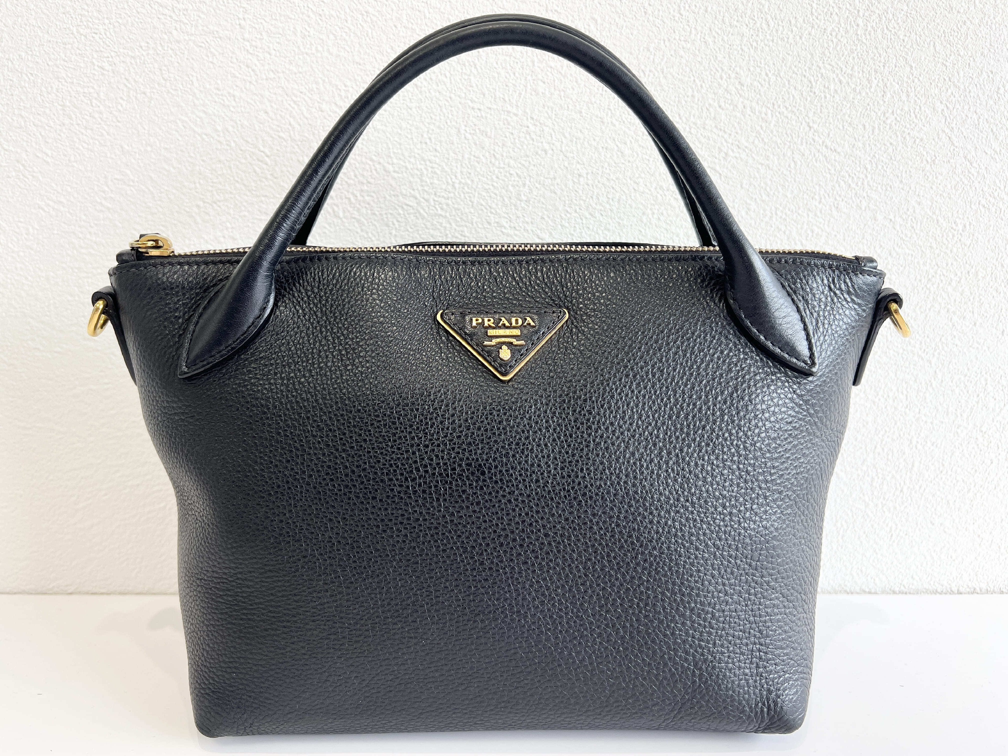 Triangle Logo Vitello Daino Leather Handbag