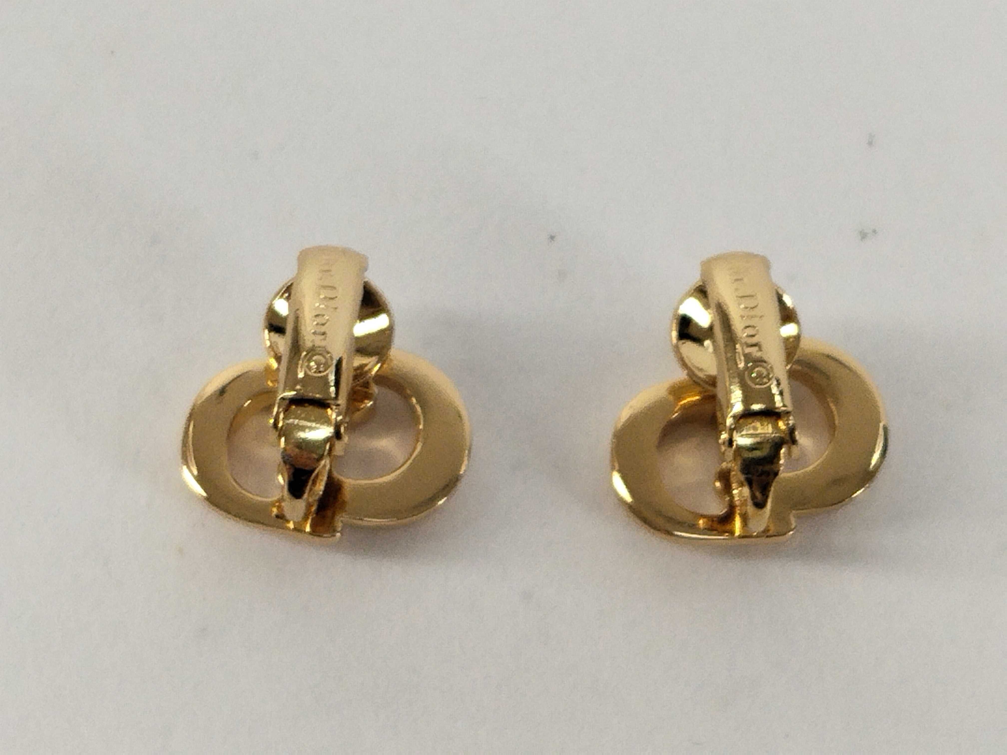 CD logo gold earrings with box. — view 3