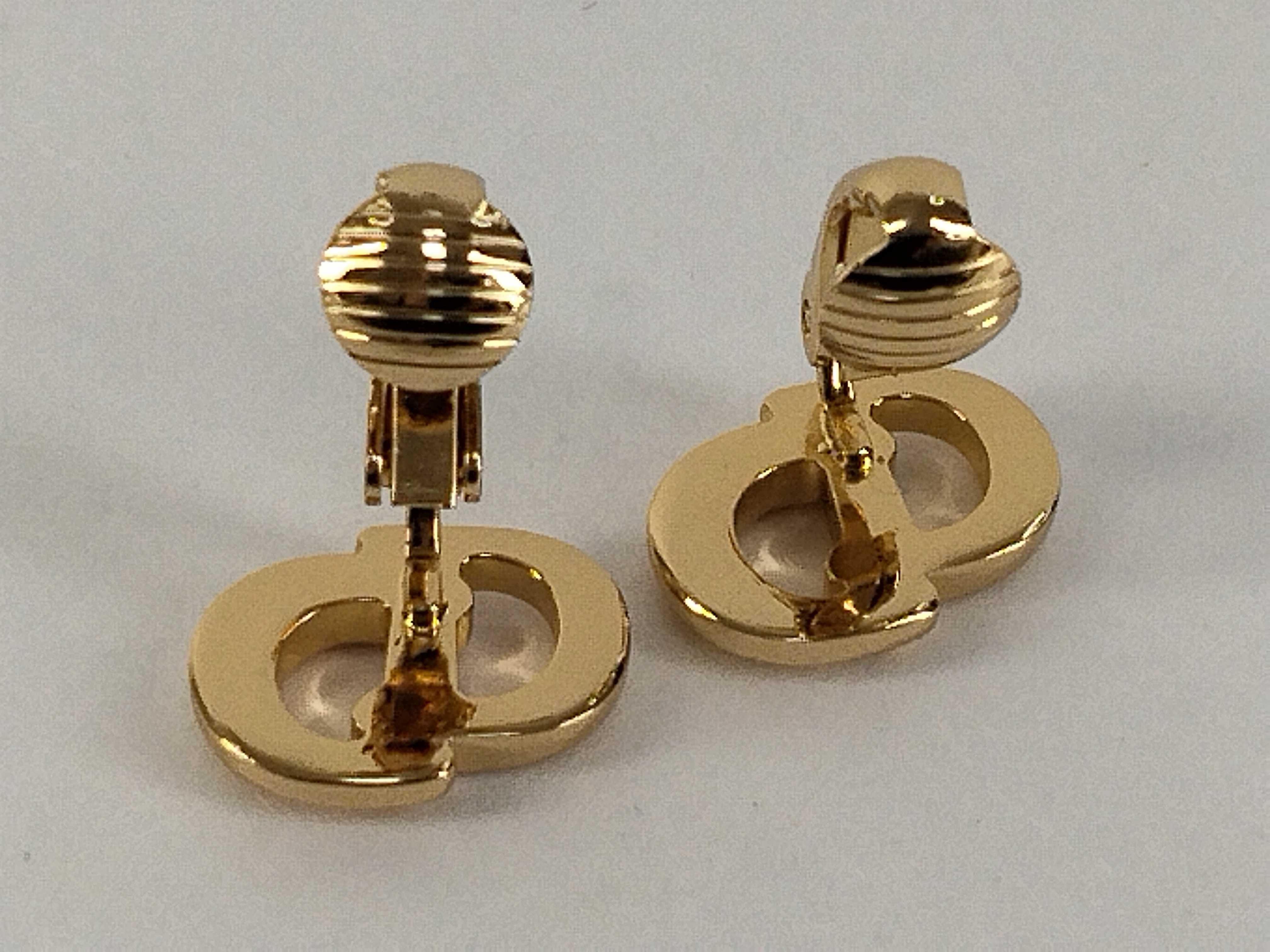 CD logo gold earrings with box. — view 6