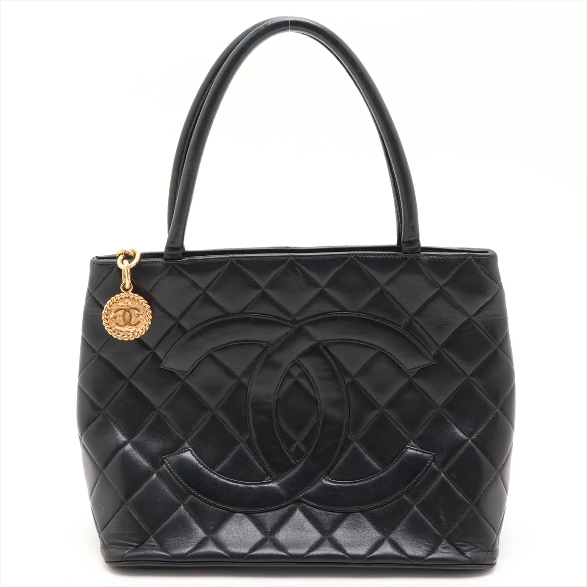 reissue lambskin tote bag, black with gold hardware, serial number unclear, in the 4th range.