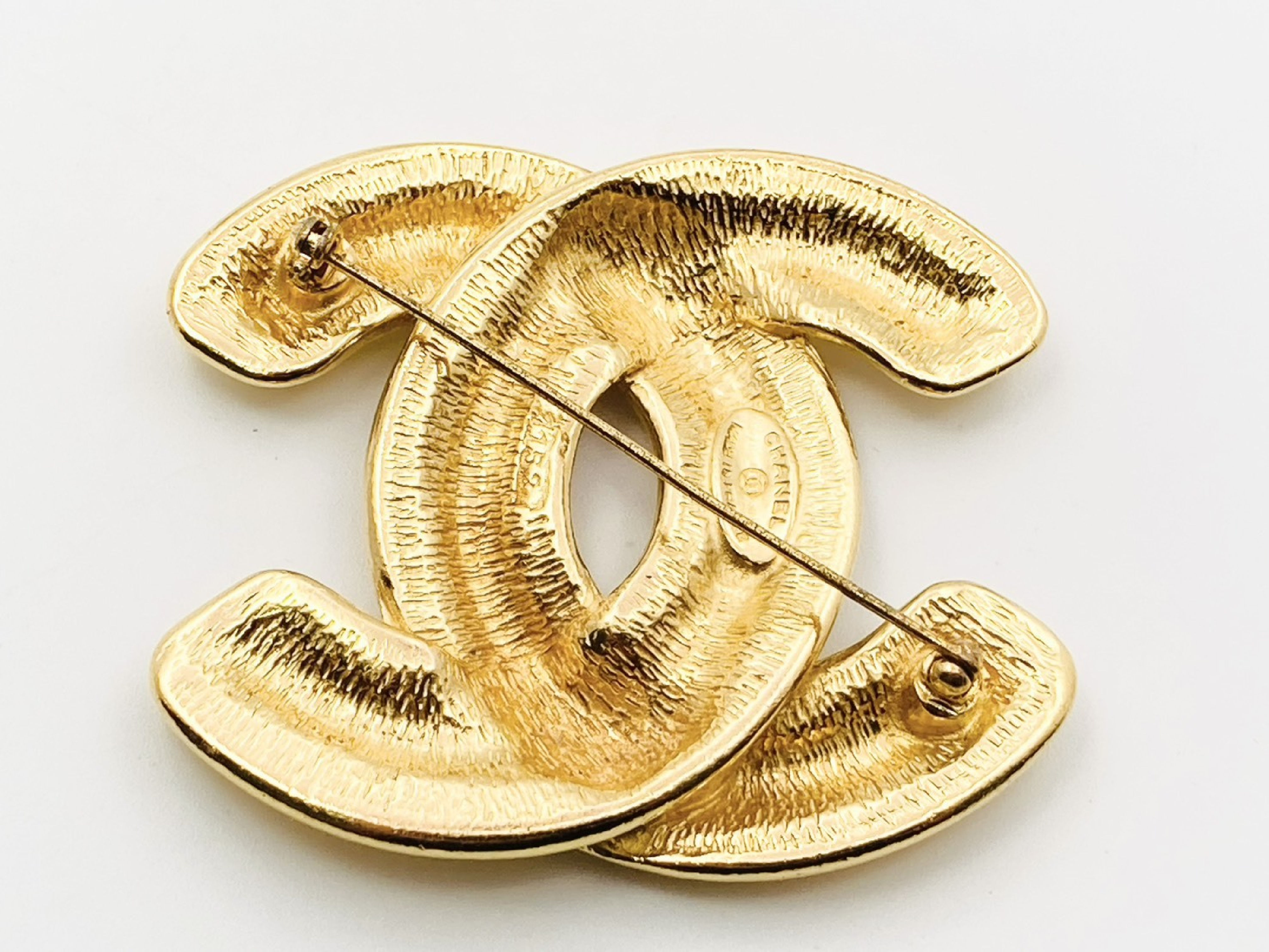 Coco Mark Matelassé Brooch (with markings, item number 1152) Gold Brooch — view 2