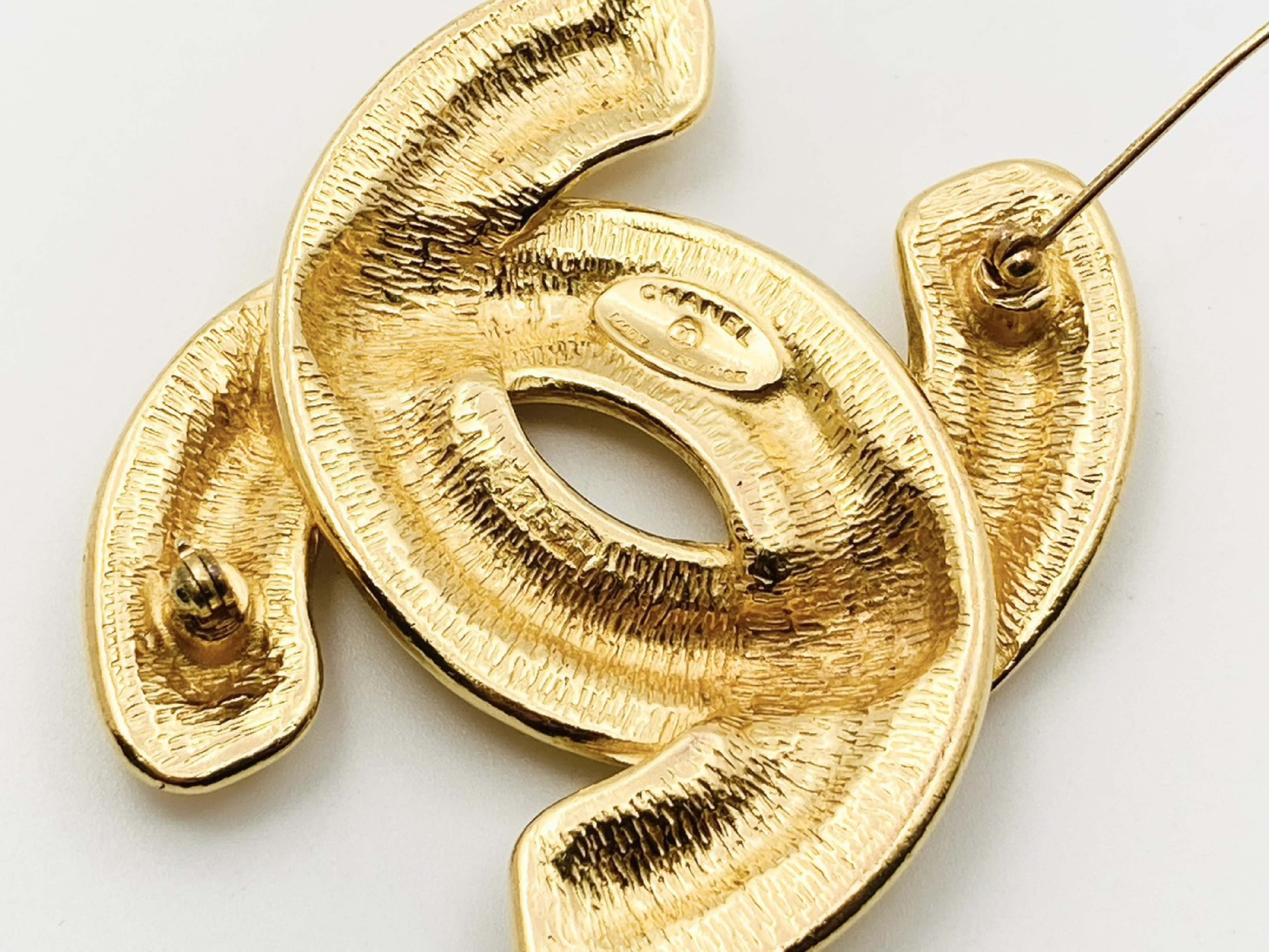 Coco Mark Matelassé Brooch (with markings, item number 1152) Gold Brooch — view 3