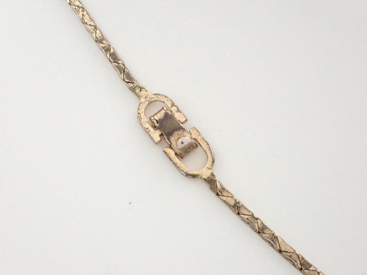 Other lines: Precious metals, necklaces, pendants, logo, rhinestones, gold. — view 2